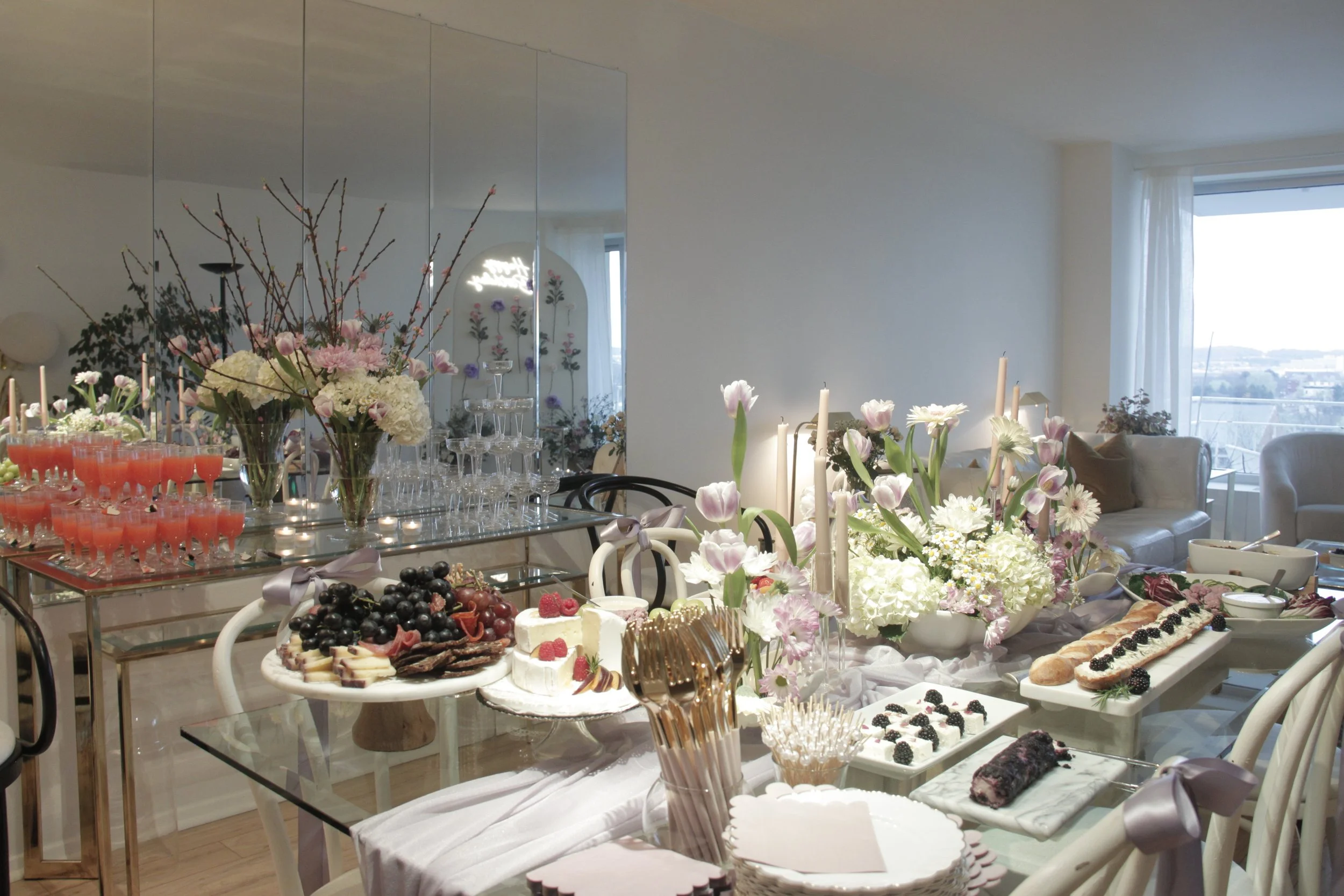 birthday-flower design-personalized celebrations-appetizer table design-purple-burgundy-theme-bloom-birthday-theme-elegant design-chess tower- chessboard-champagne tower-signature bar menu- tequila sunrise tower-2025 backdrop design- trendy backdrop 