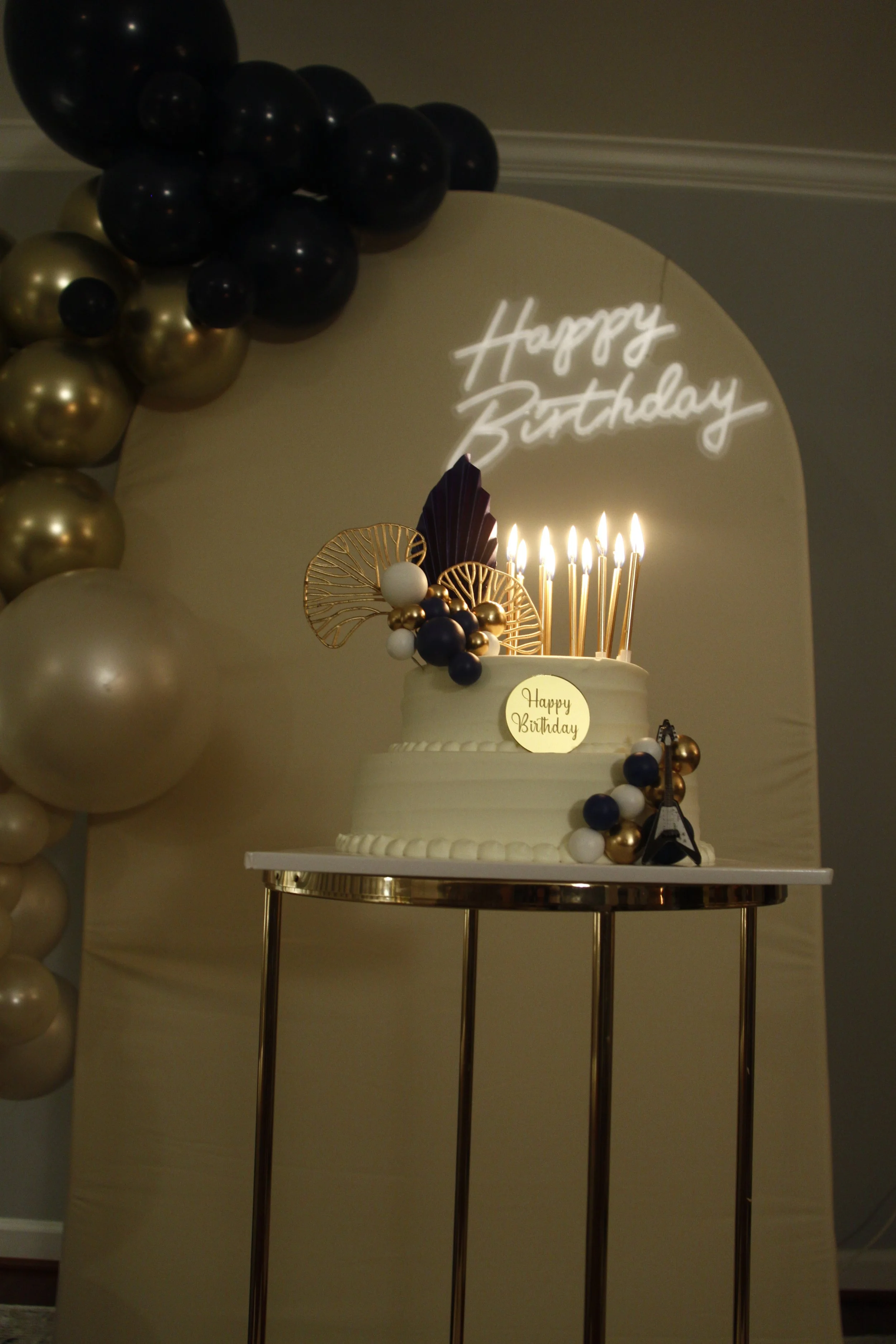navy blue-gold-theme-birthday-party-birthday cake-guitar-classic-timeless-backdrop-balloons decoration-event-event planner
