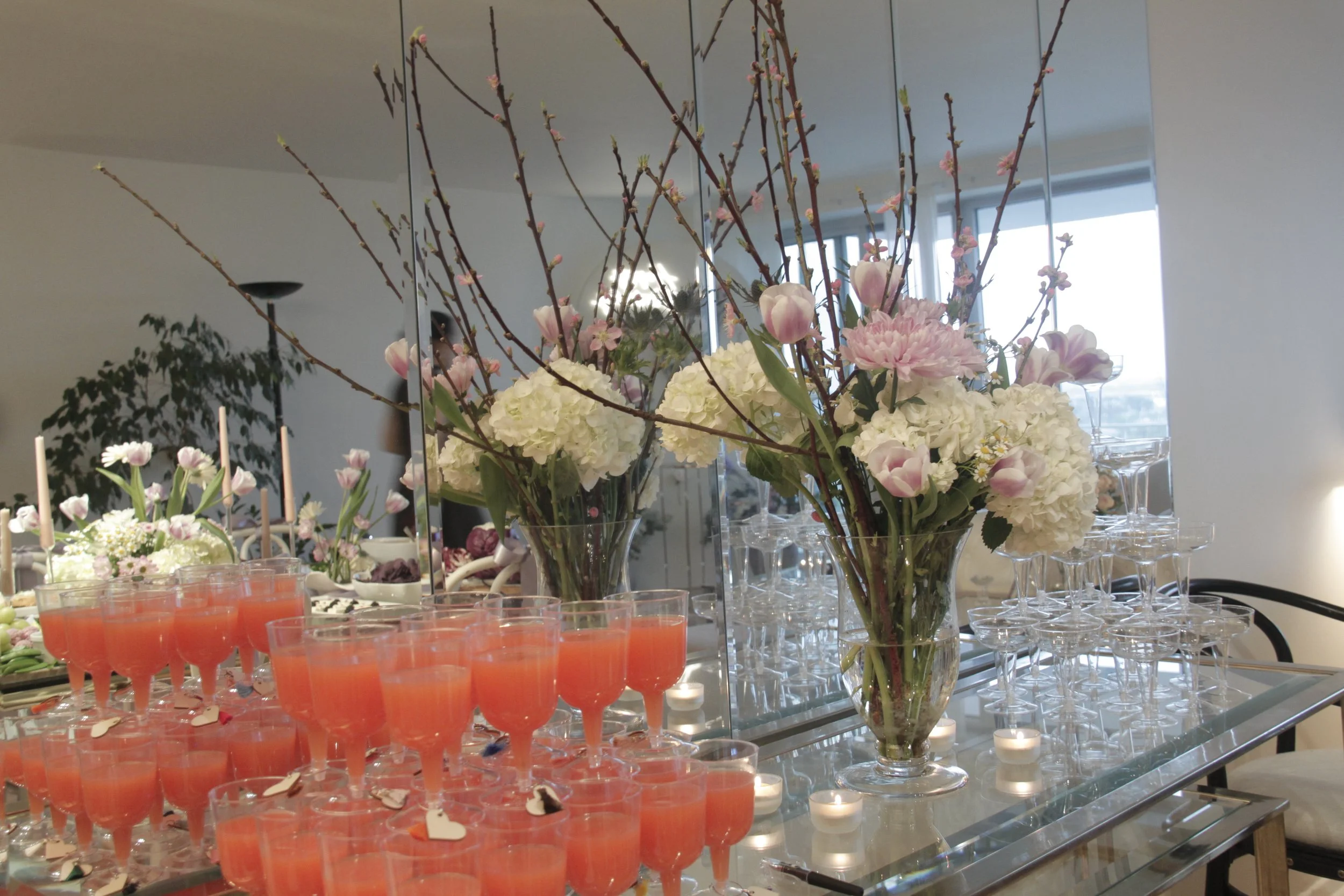 birthday-flower design-personalized celebrations-appetizer table design-purple-burgundy-theme-bloom-birthday-theme-elegant design-champagne tower-signature bar menu- tequila sunrise tower 