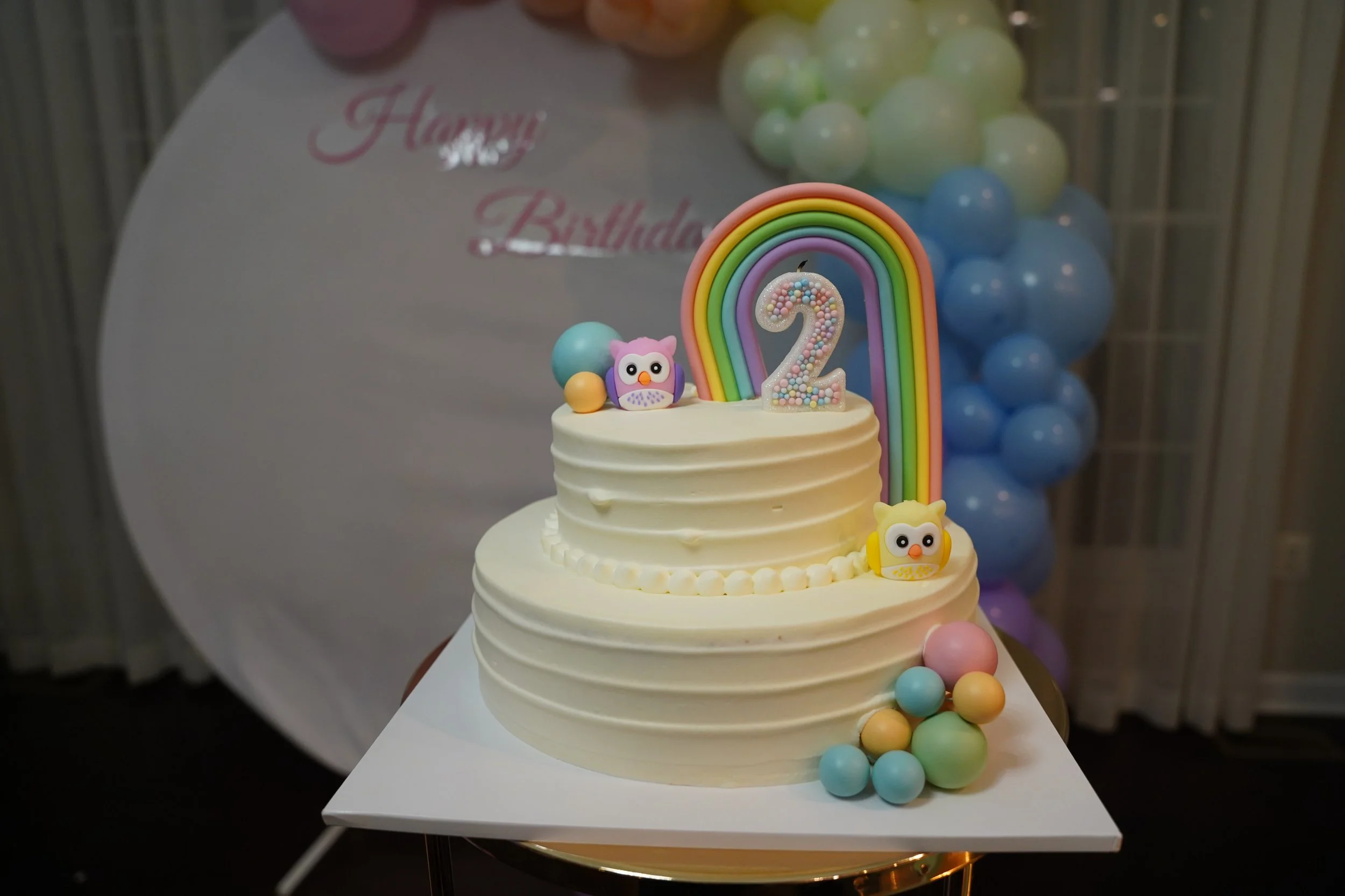 kids-birthday-owl-rainbow-theme-birthday cake-pastel balloons-kids-activity-personalized celebrations-design-rainbow -theme