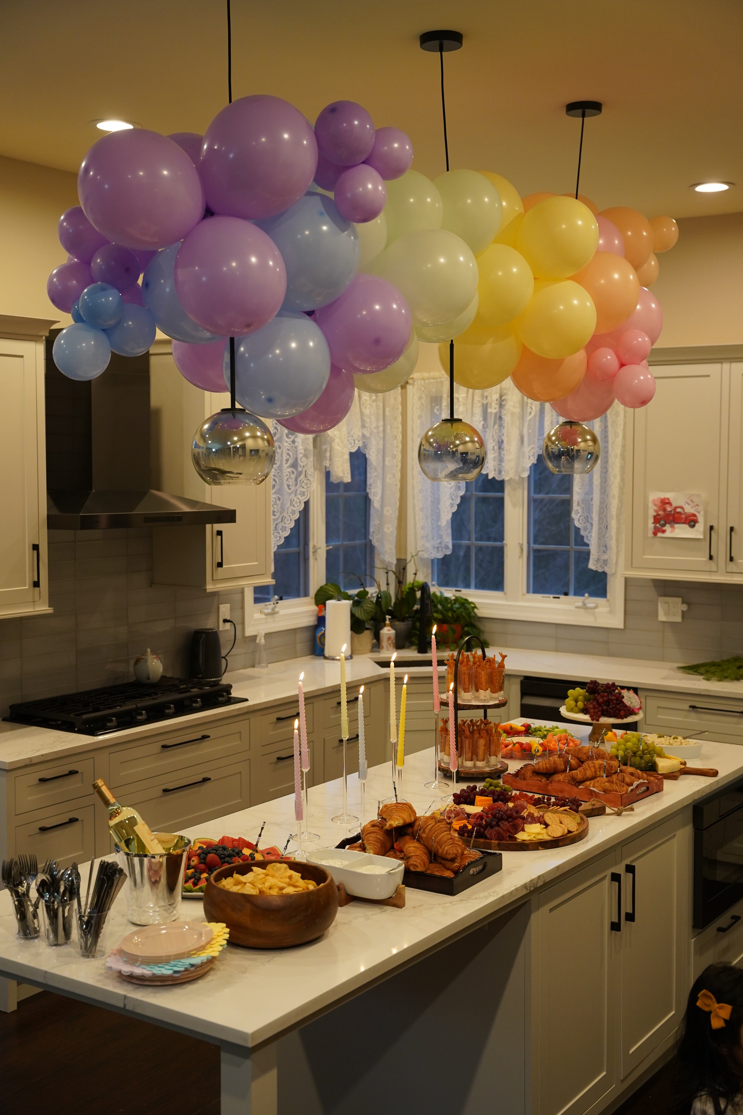 kids-birthday-owl-rainbow-theme-pastel balloons-kids-activity-personalized celebrations-design-rainbow -theme-appetizer table design-rainbow -theme