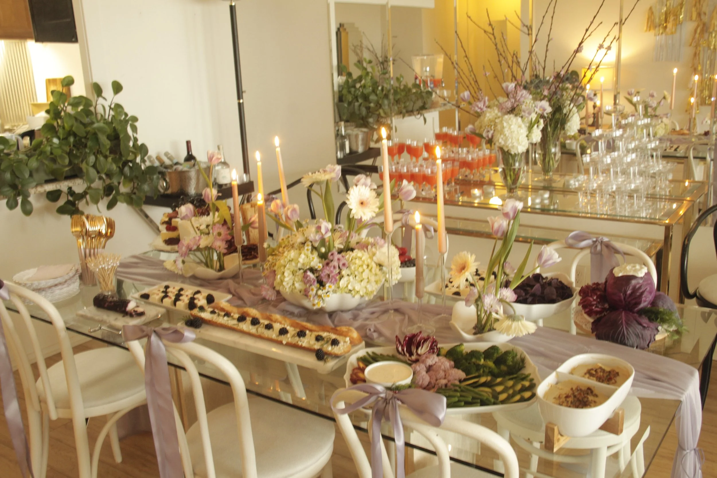 birthday-flower design-personalized celebrations-appetizer table design-purple-burgundy-theme-bloom-birthday-theme-elegant design-chess tower- chessboard-champagne tower-signature bar menu- tequila sunrise tower-2025 backdrop design- trendy backdrop 