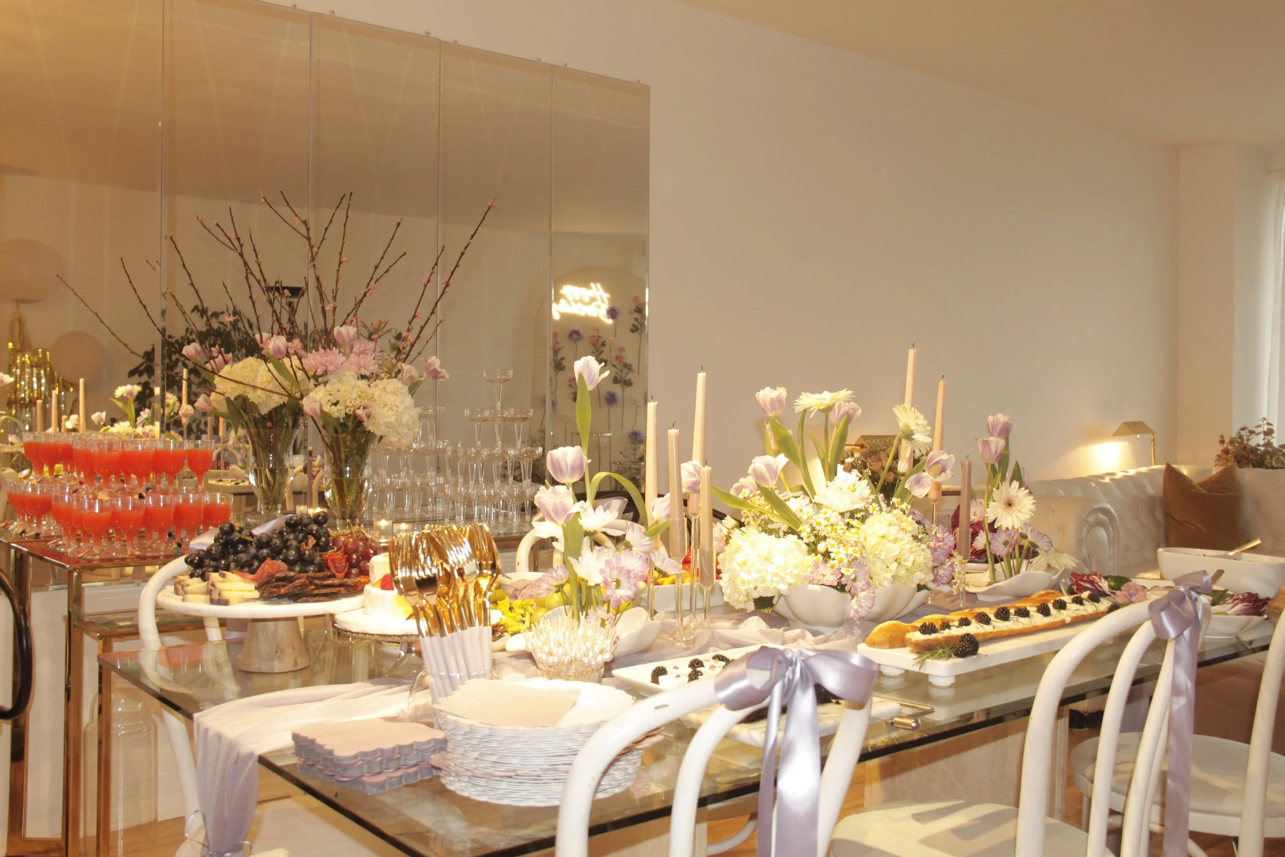 birthday-flower design-personalized celebrations-appetizer table design-purple-burgundy-theme-bloom-birthday-theme-elegant design-chess tower- chessboard-champagne tower-signature bar menu- tequila sunrise tower-2025 backdrop design- trendy backdrop 