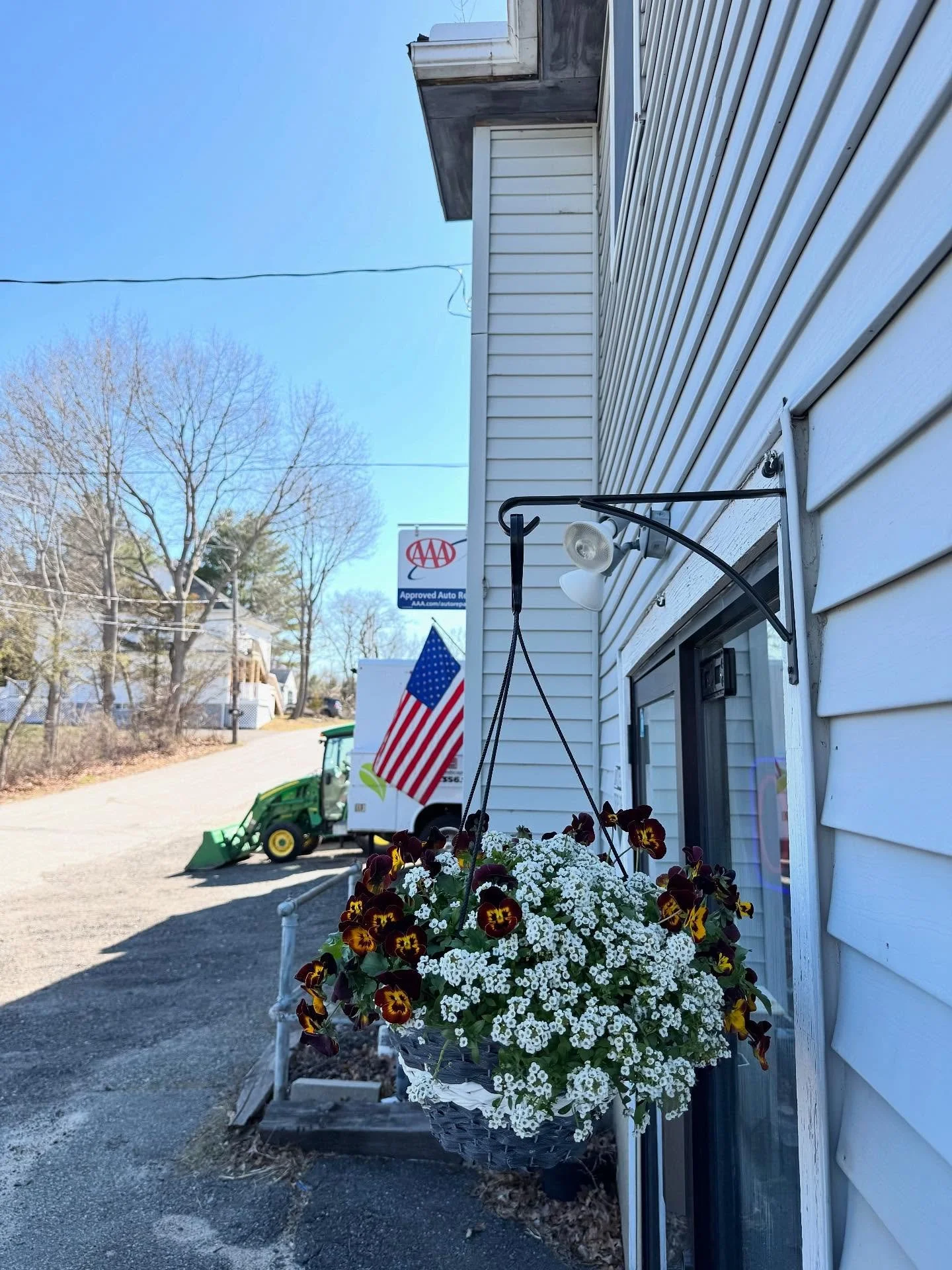 Sprucing up the front of the shop for spring. Finally hung the flag out & thanks to @gordonflorist for the hanging plant! Now that the weather is changing, it’s a good time to come get your vehicles diagnosed! Come on down or call the shop