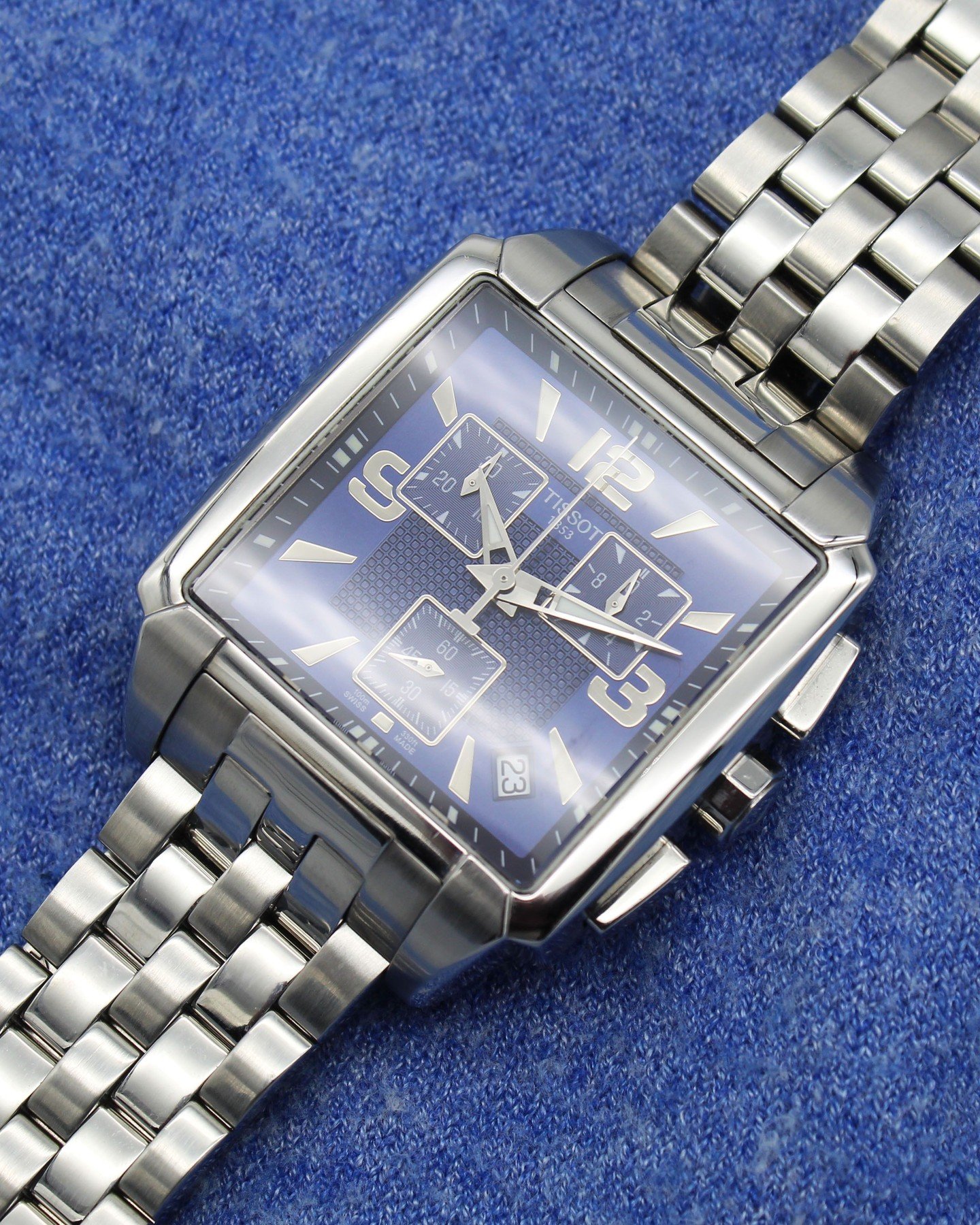 Something a little different from the usual round case 💙⬜ 

🟦 Blue textured chronograph dial
🔩 Stainless steel case &amp; bracelet
⏱️ Swiss quartz chronograph movement
🇨🇭 Swiss Made
💷 &pound;395

Would you wear a square watch, or do you prefer 