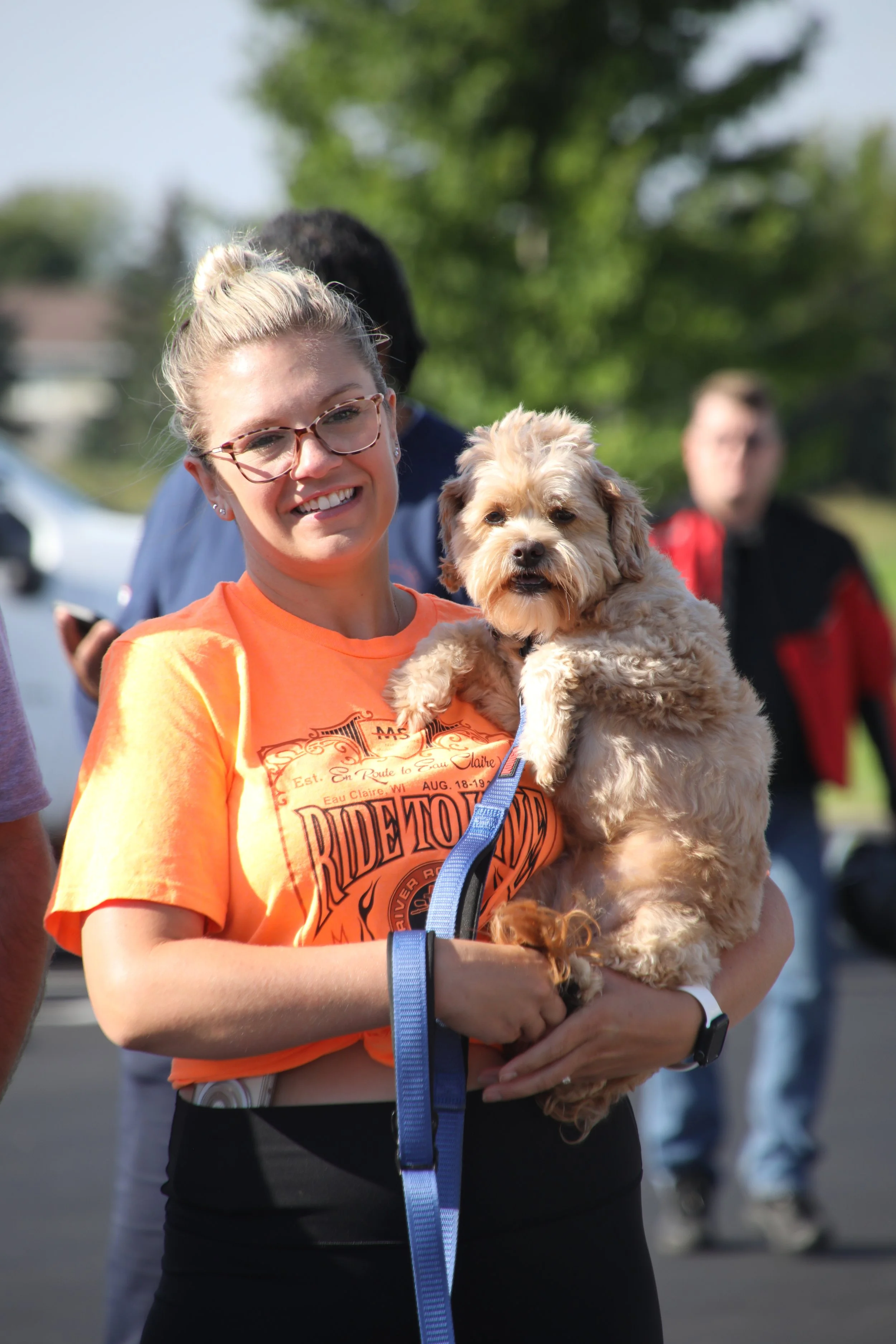 Participant holding her dog