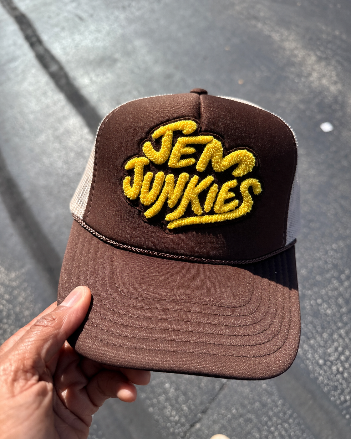 Jem Junkies Trucker Hat in Sunlight.png