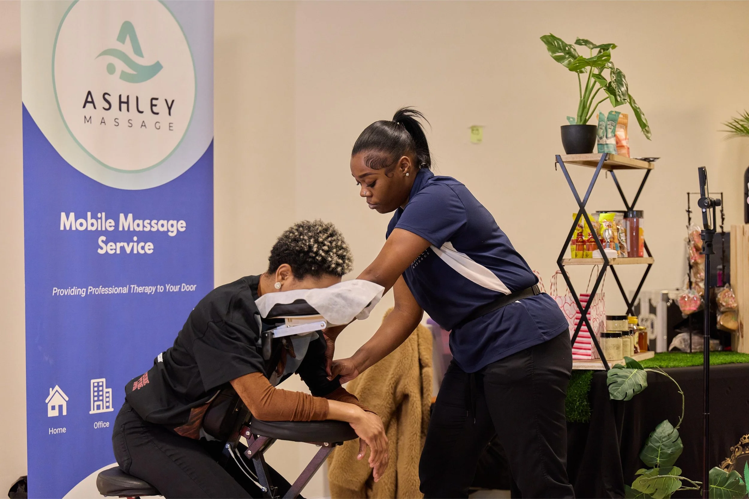 Ashley Massage at Jem Junkies Custom Grillz and Tooth Gems Grand Opening