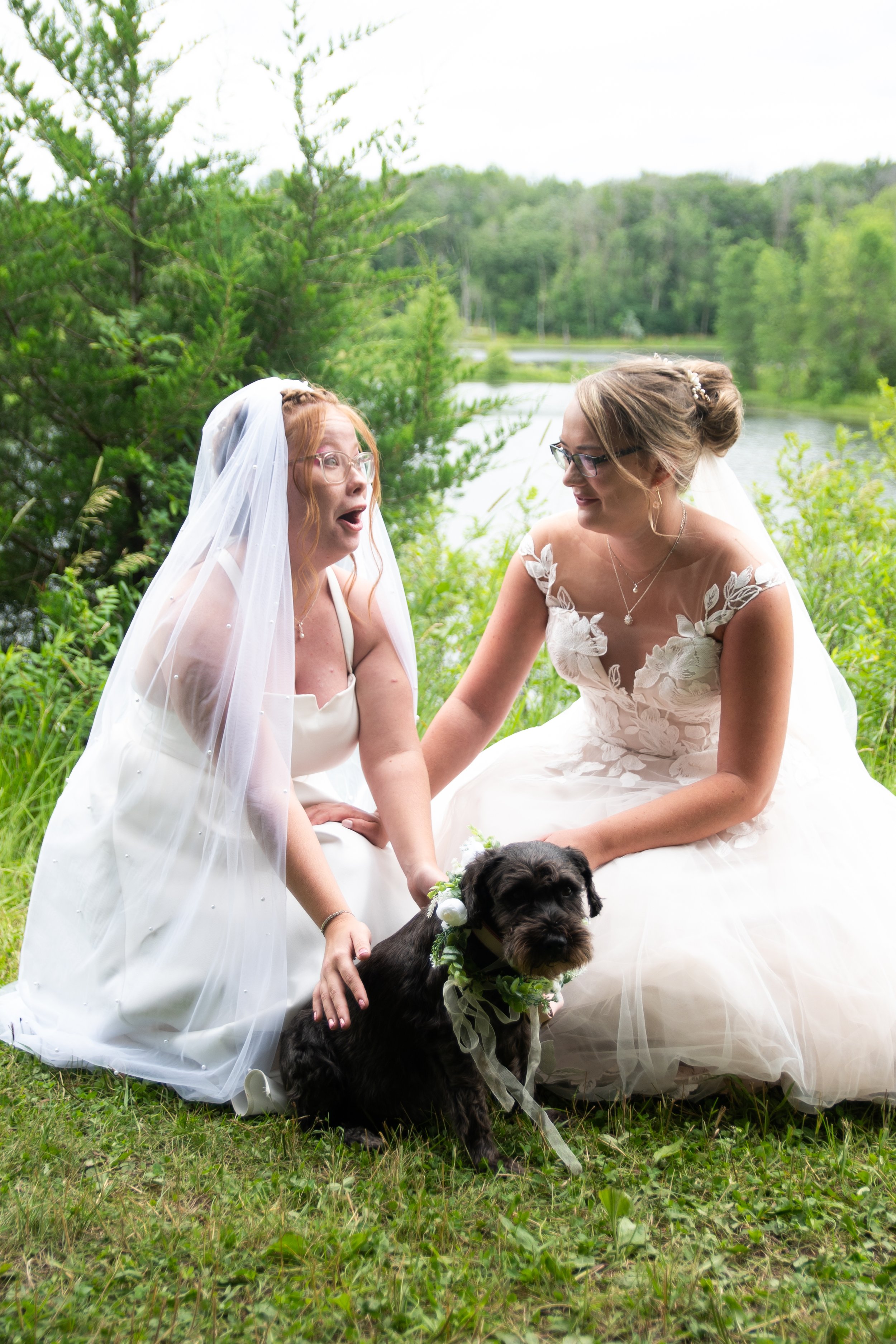 Minnesota couple with their dog on their wedding day surrounded by nature.