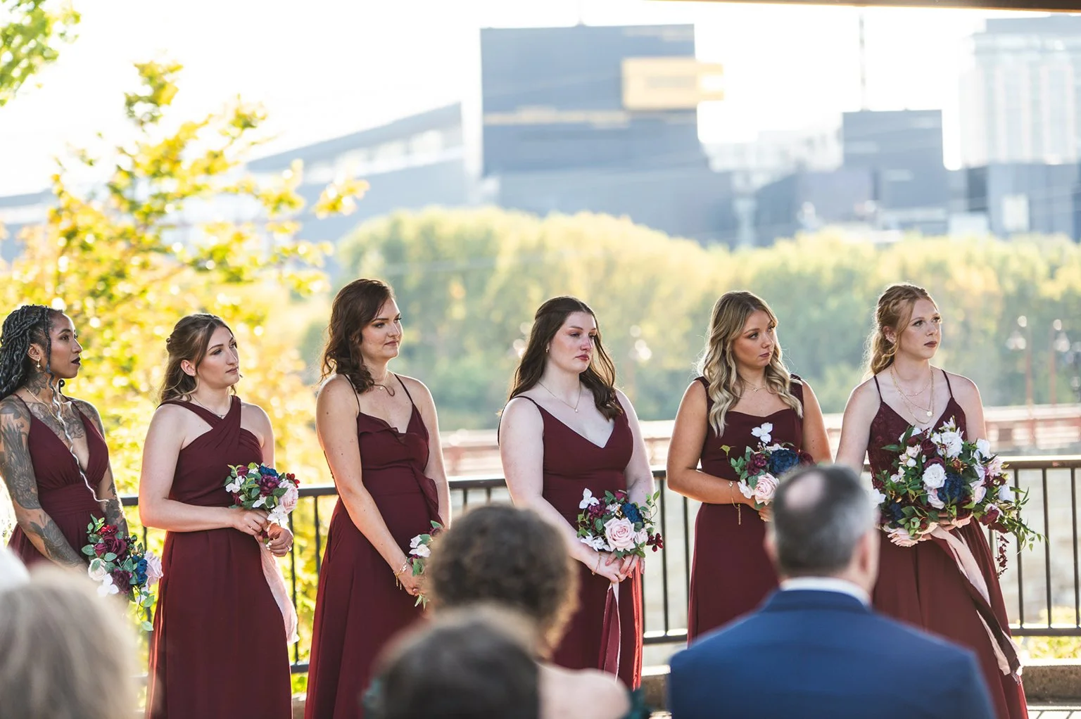 Bridesmaids during wedding ceremony at the Minneapolis Event Center in Minneapolis.