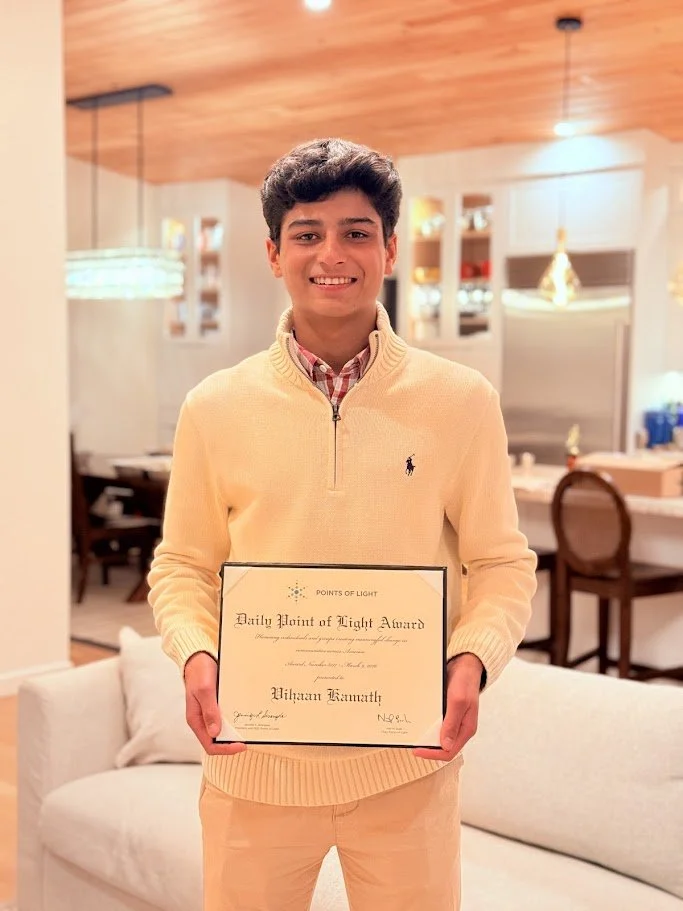 Vihaan Kamath, founder of Cookie for a Cause, receiving the Points of Light Daily Point of Light Award for teen-led nonprofit service and children's charity fundraising in Greenwich CT