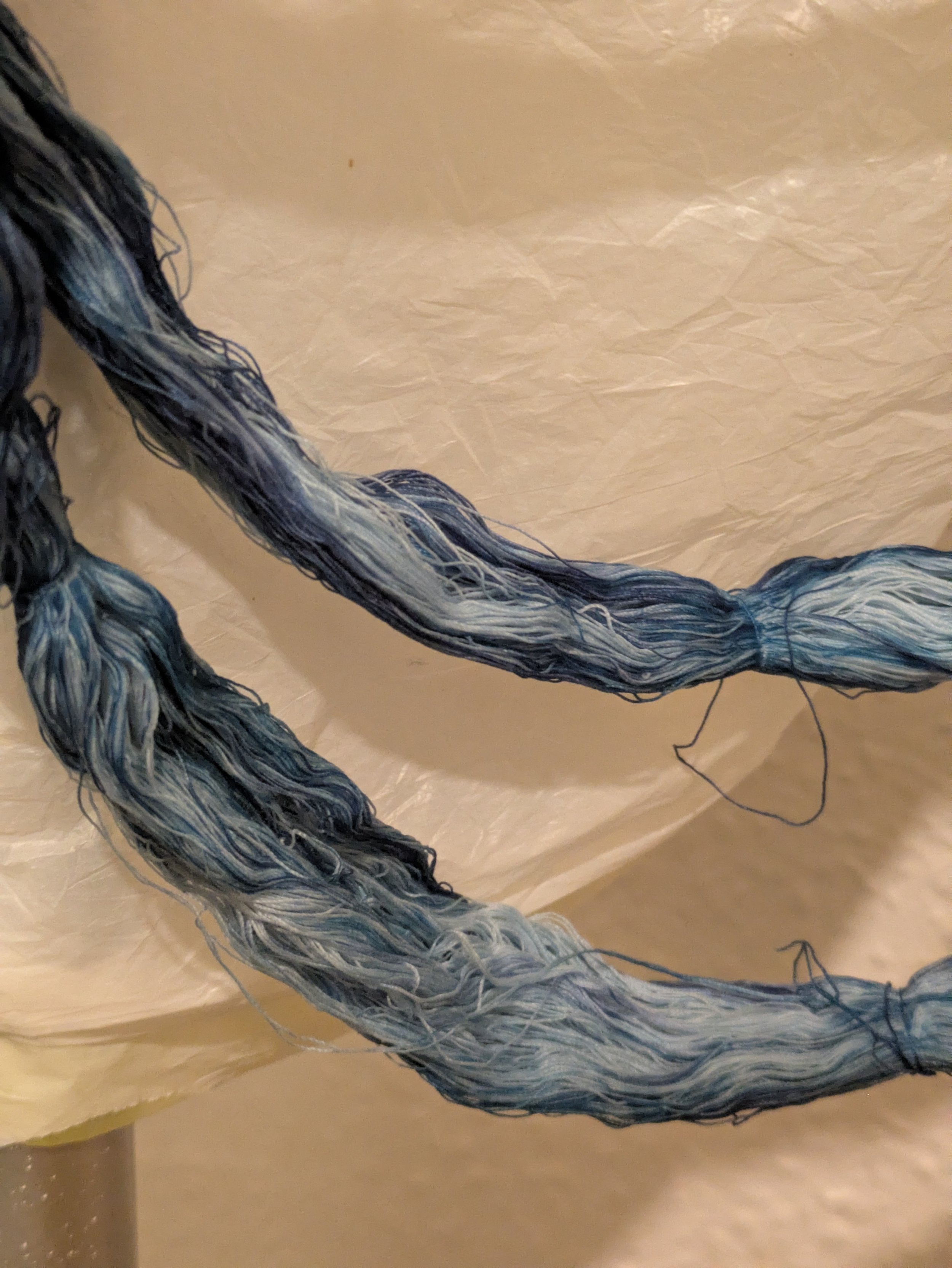 The thread used in thee quilting was also cyanotyped in irregular intervals to create a variegated thread. 