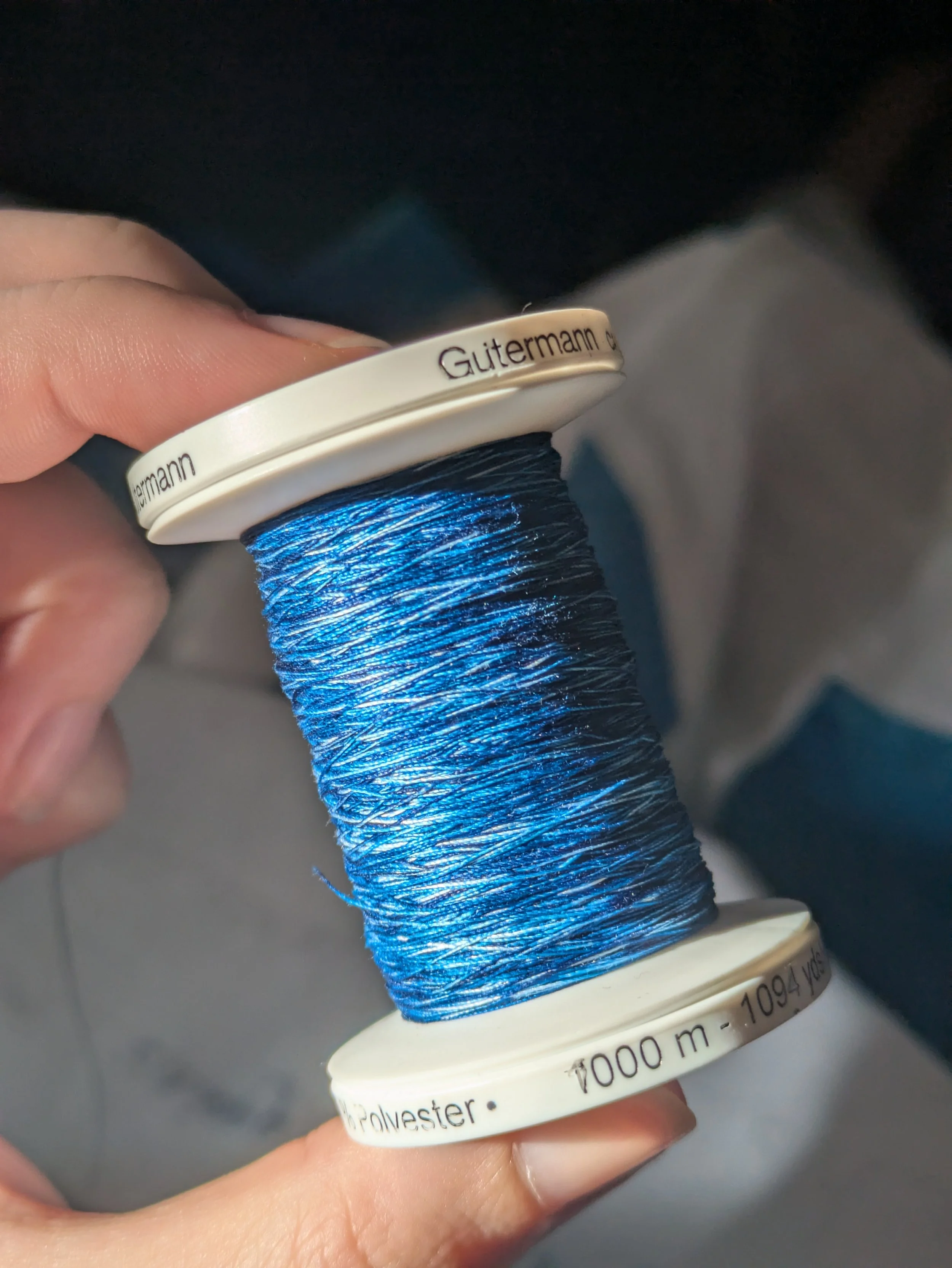 I created a darker, more even spool of cyanotype thread to work the embroidery in. This should make it more legible even in the fainter parts of the variegation.  