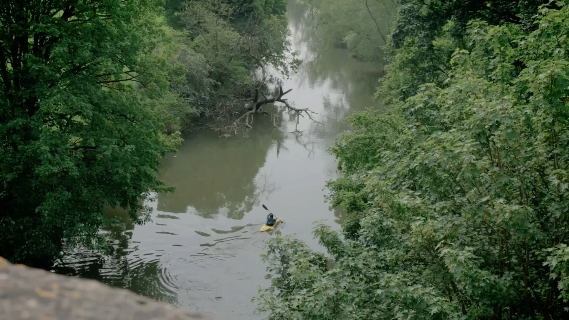 A kayaker paddling on the River Avon