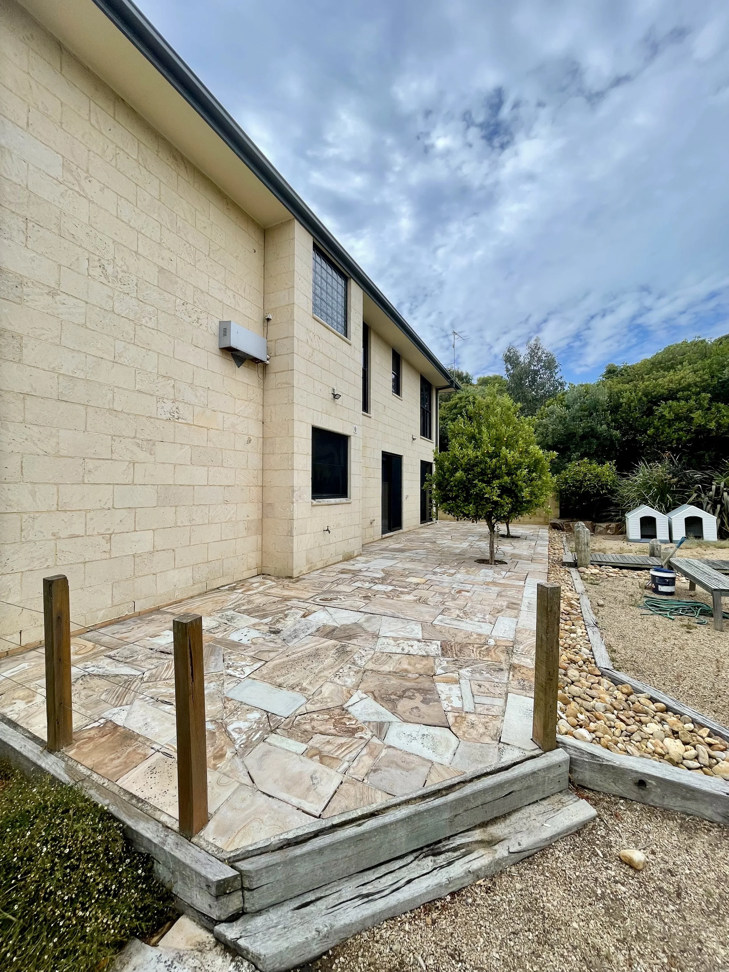 Sandstone patio and exterior surface cleaning for high-end residential property Melbourne — SUDS Group