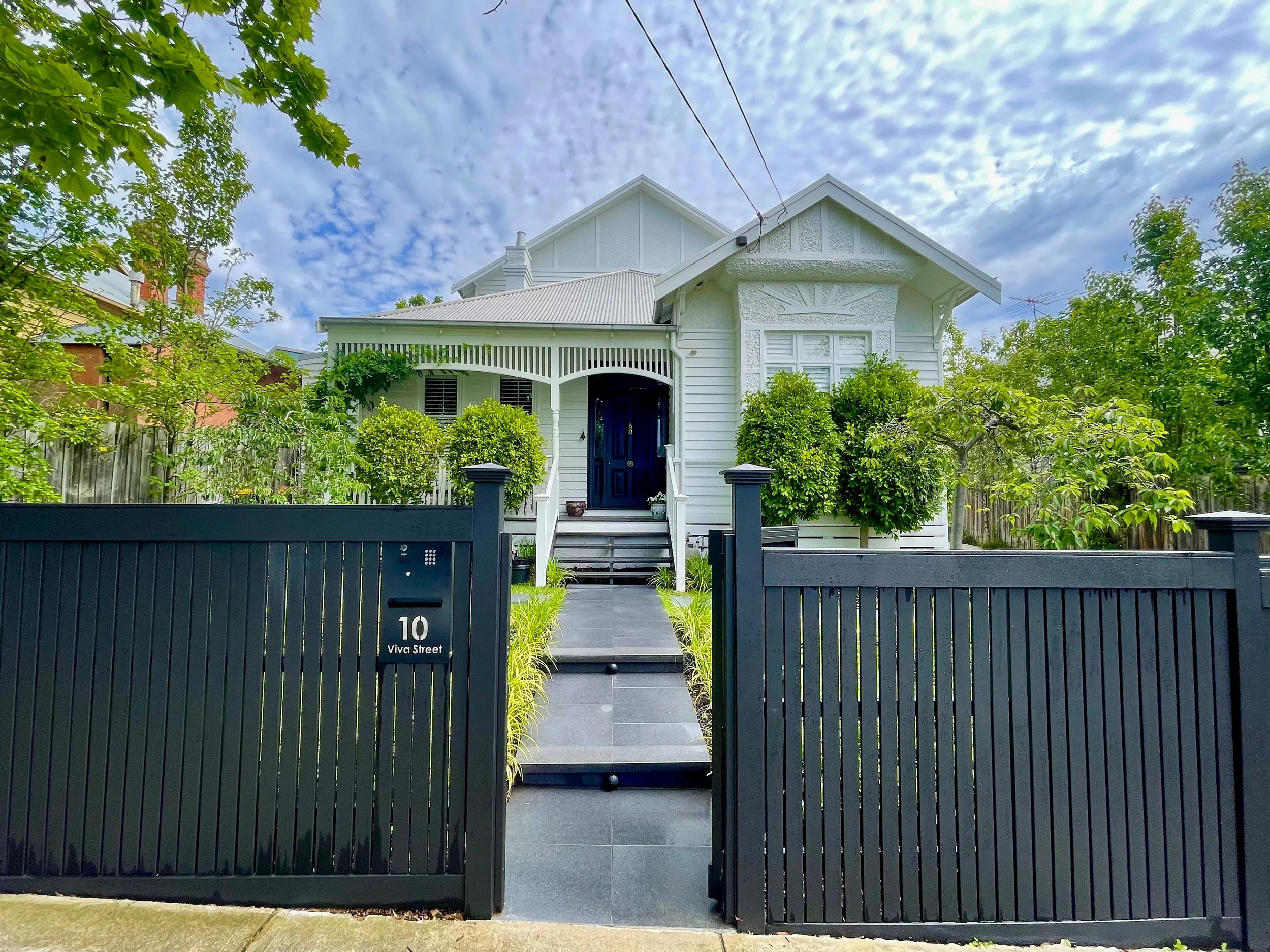 Residential exterior cleaning weatherboard home Melbourne — SUDS Group premium pressure washing