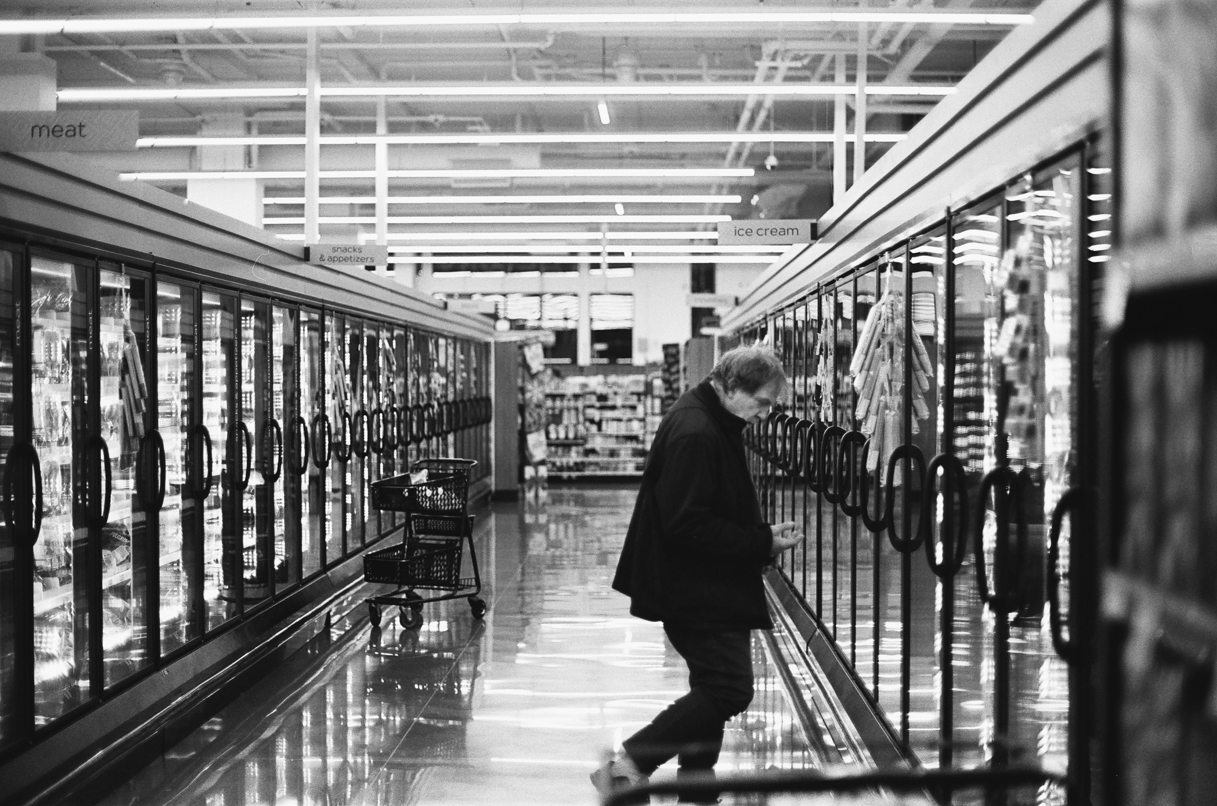 Groceries and cart, far apart.png