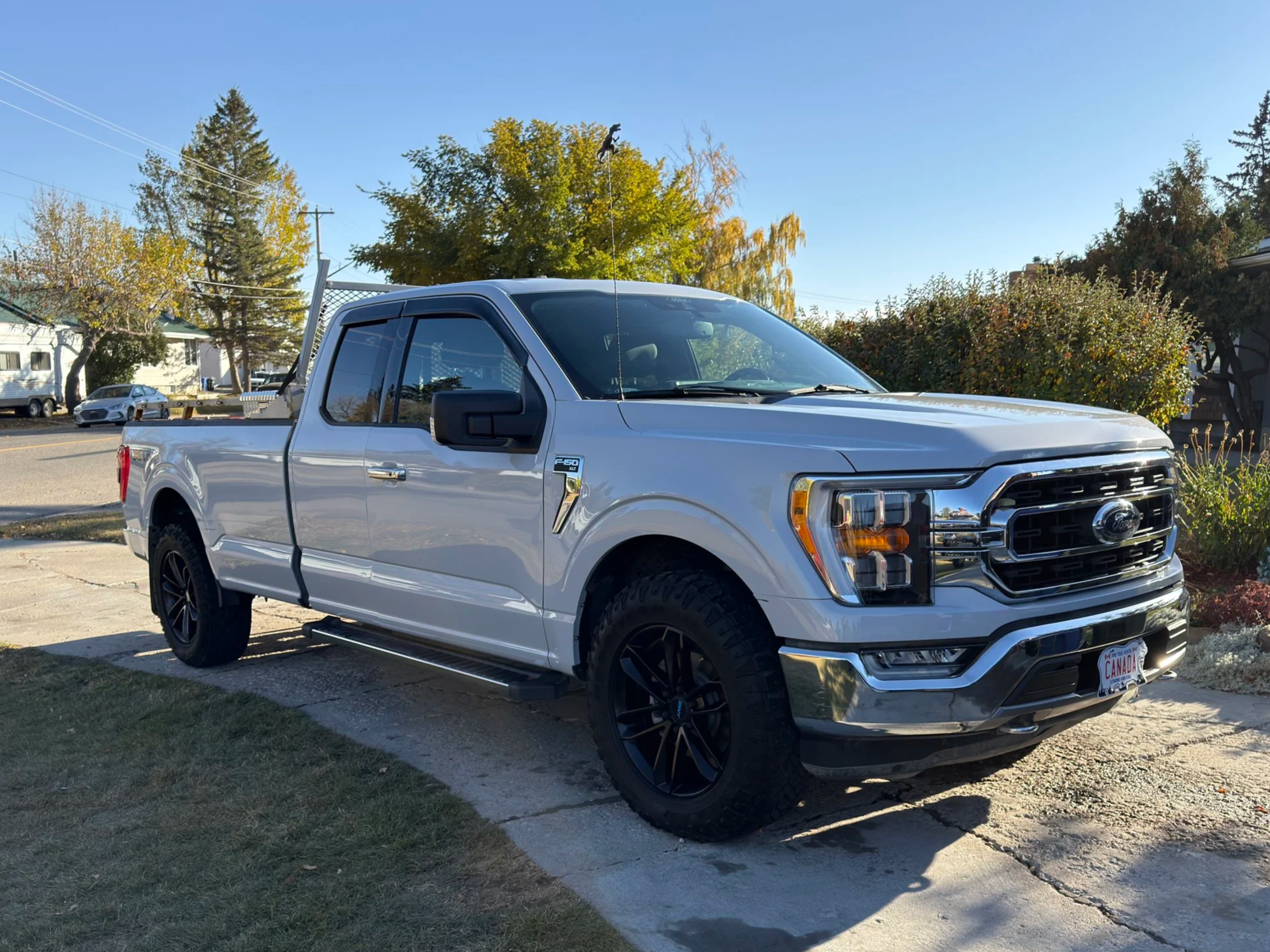 Mirror-like finish after paint correction and exterior wash on a client's truck in Alberta.
