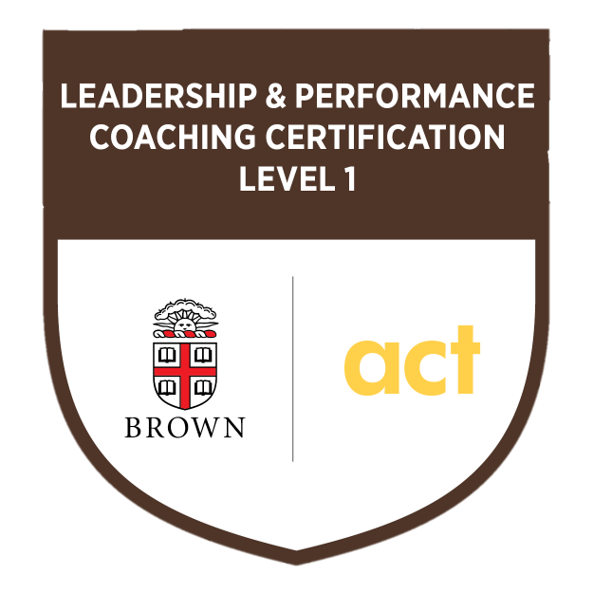 Shield-shaped badge with brown top and white lower half, displaying text 'Leadership & Performance Coaching Certification Level 1', a university crest with a red and white shield and a tree, and the yellow logo 'act'.