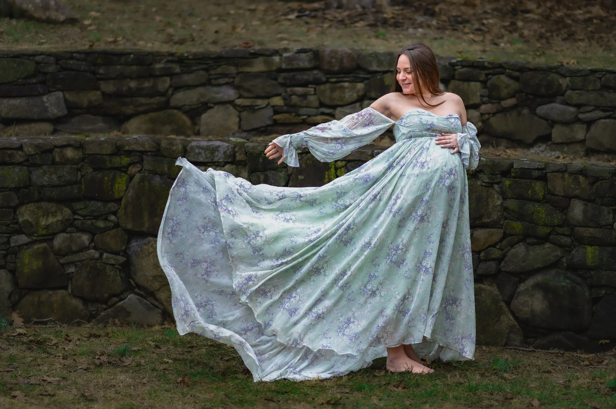 A gorgeous pregnant woman poses for the camera