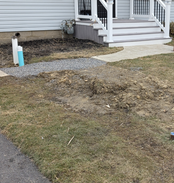 Lawn restoration completed after sewer line repairs in West Seneca, New York.