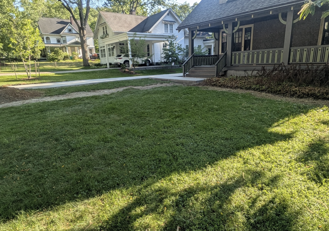 Finished lawn and landscaping after grading and landscape improvements by Kielty Landscaping in West Seneca NY