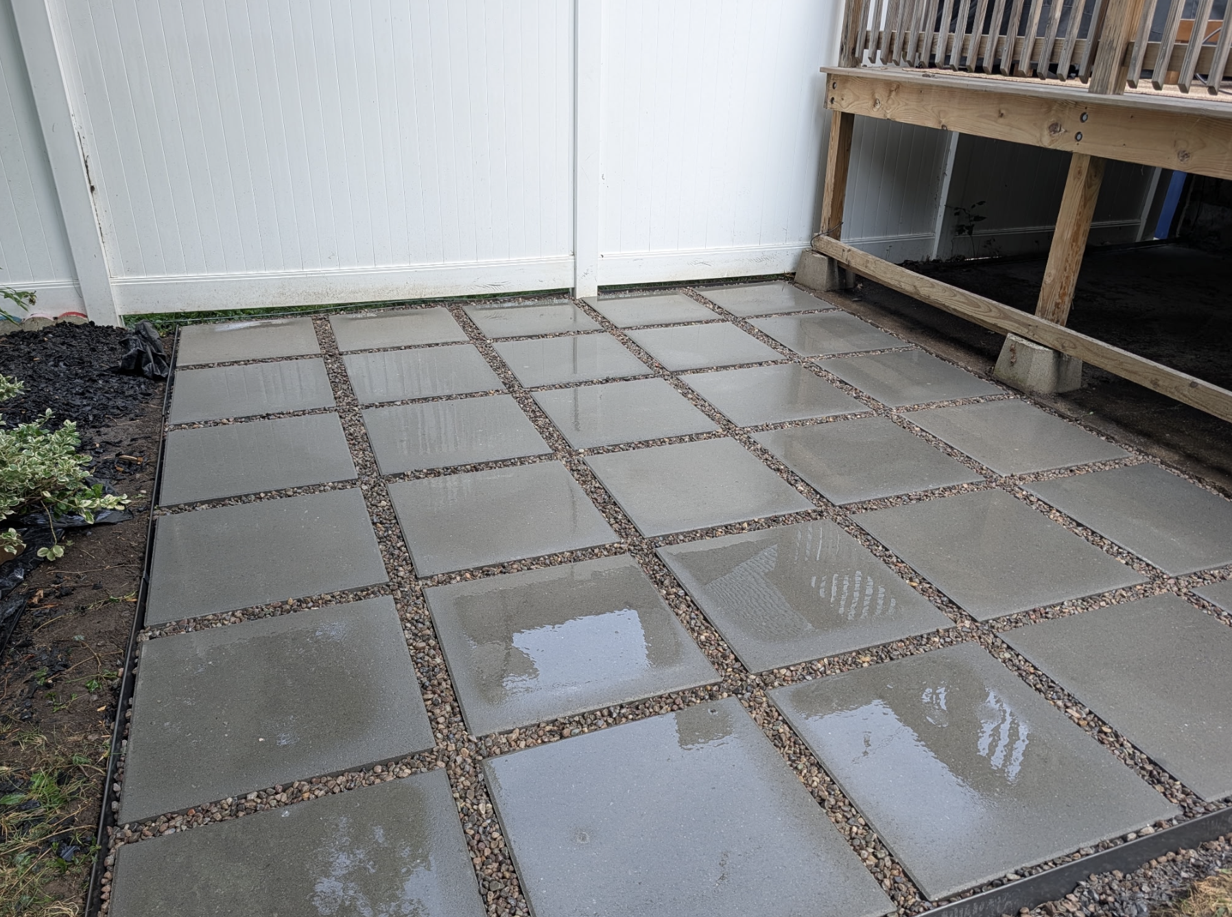 Large paver patio with pea gravel joints installed by Kielty Landscaping Services