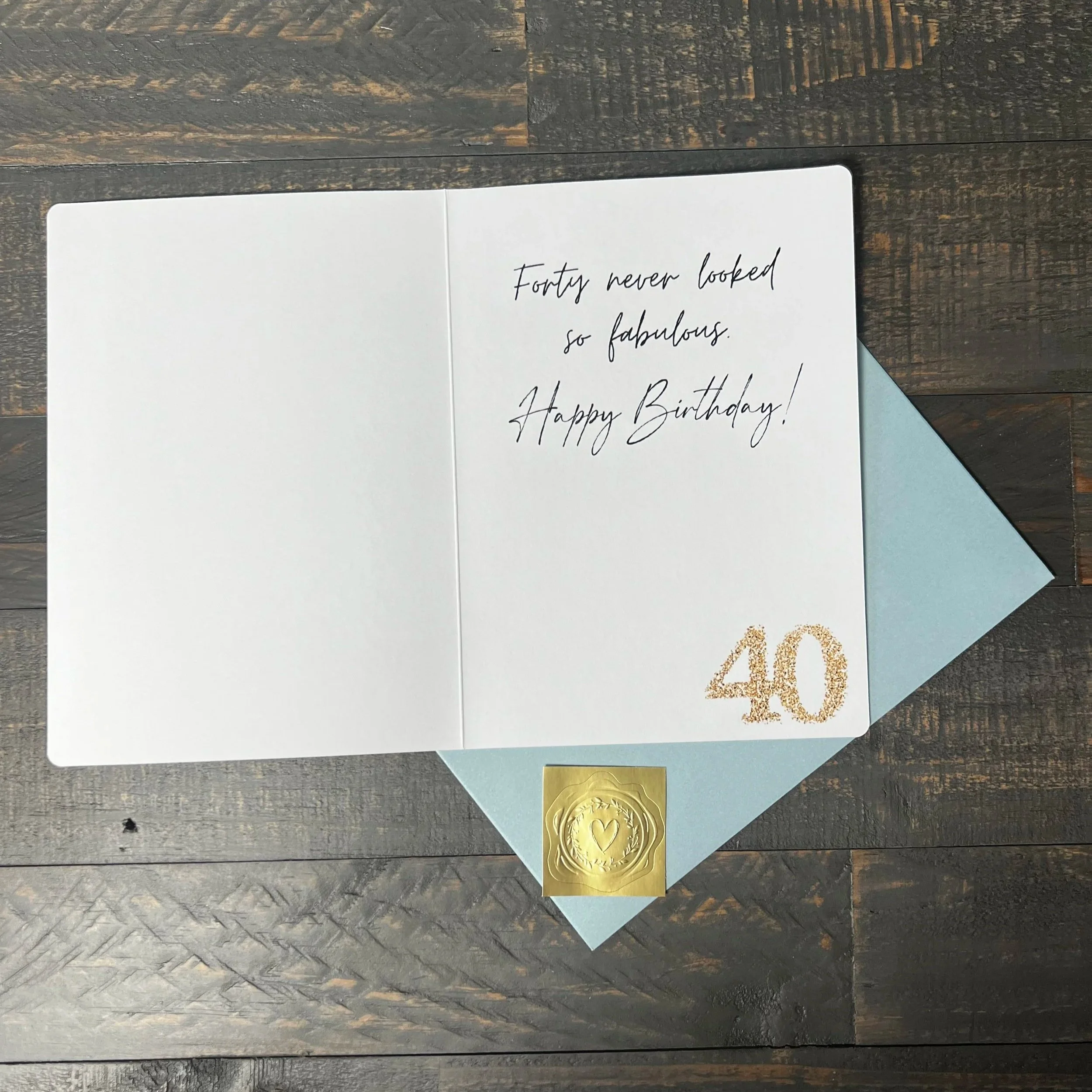 Open Forty & Fabulous birthday card with classic birthday message.