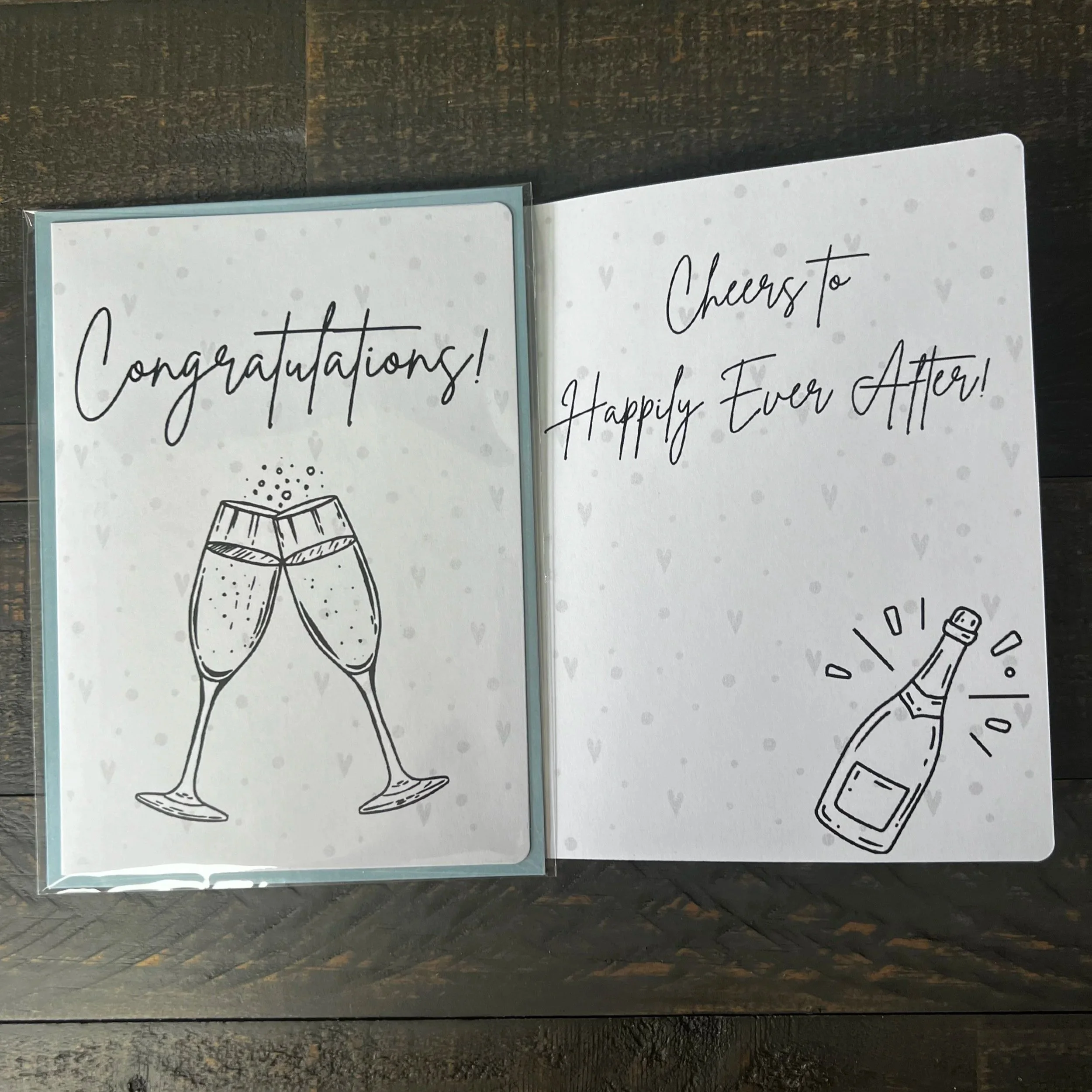 Front and inside of Cheers to Happily Ever After Wedding Card showing the wedding message.