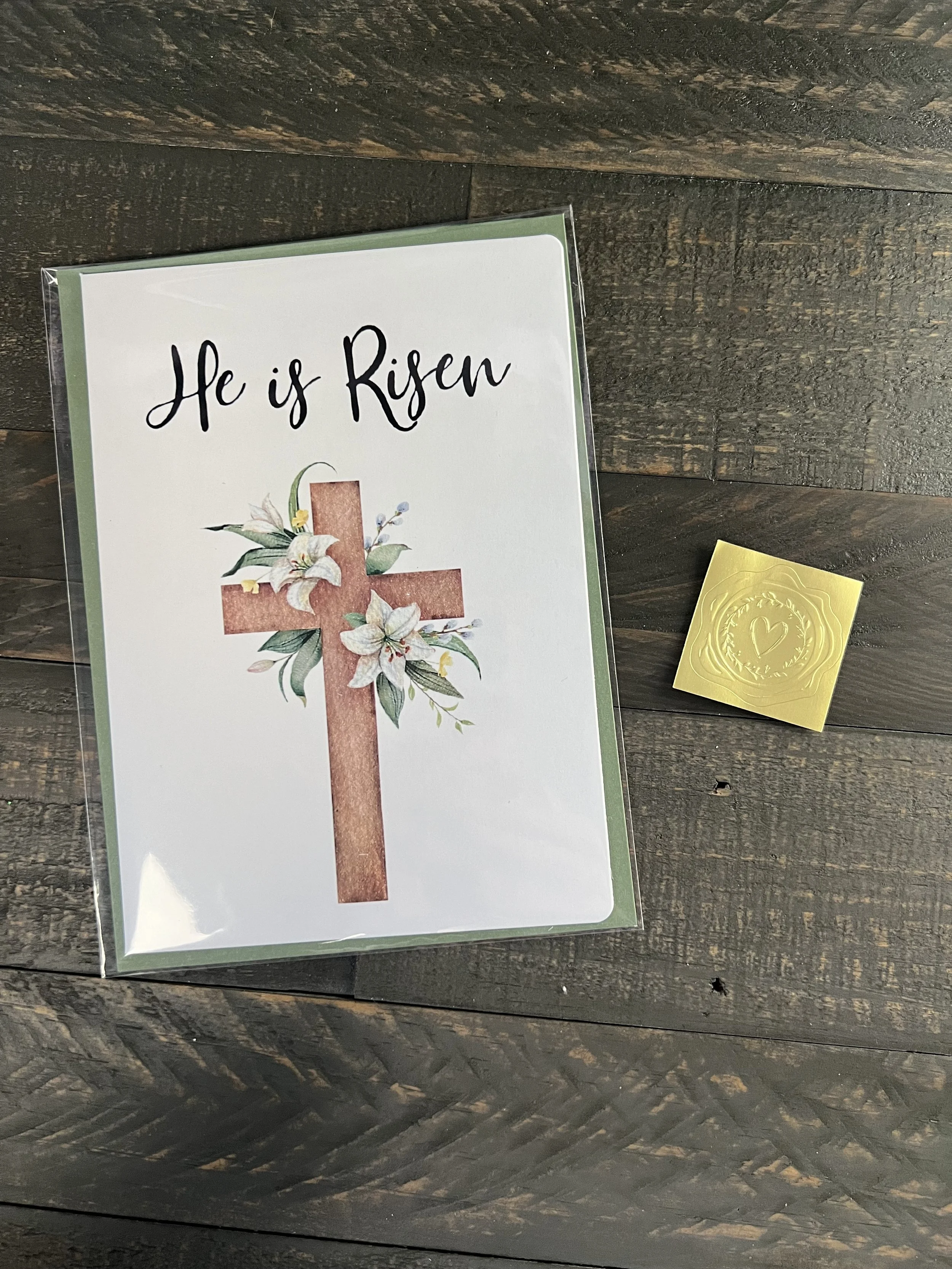 Easter card with coordinating envelope and gold wax seal sticker styled on rustic wood surface