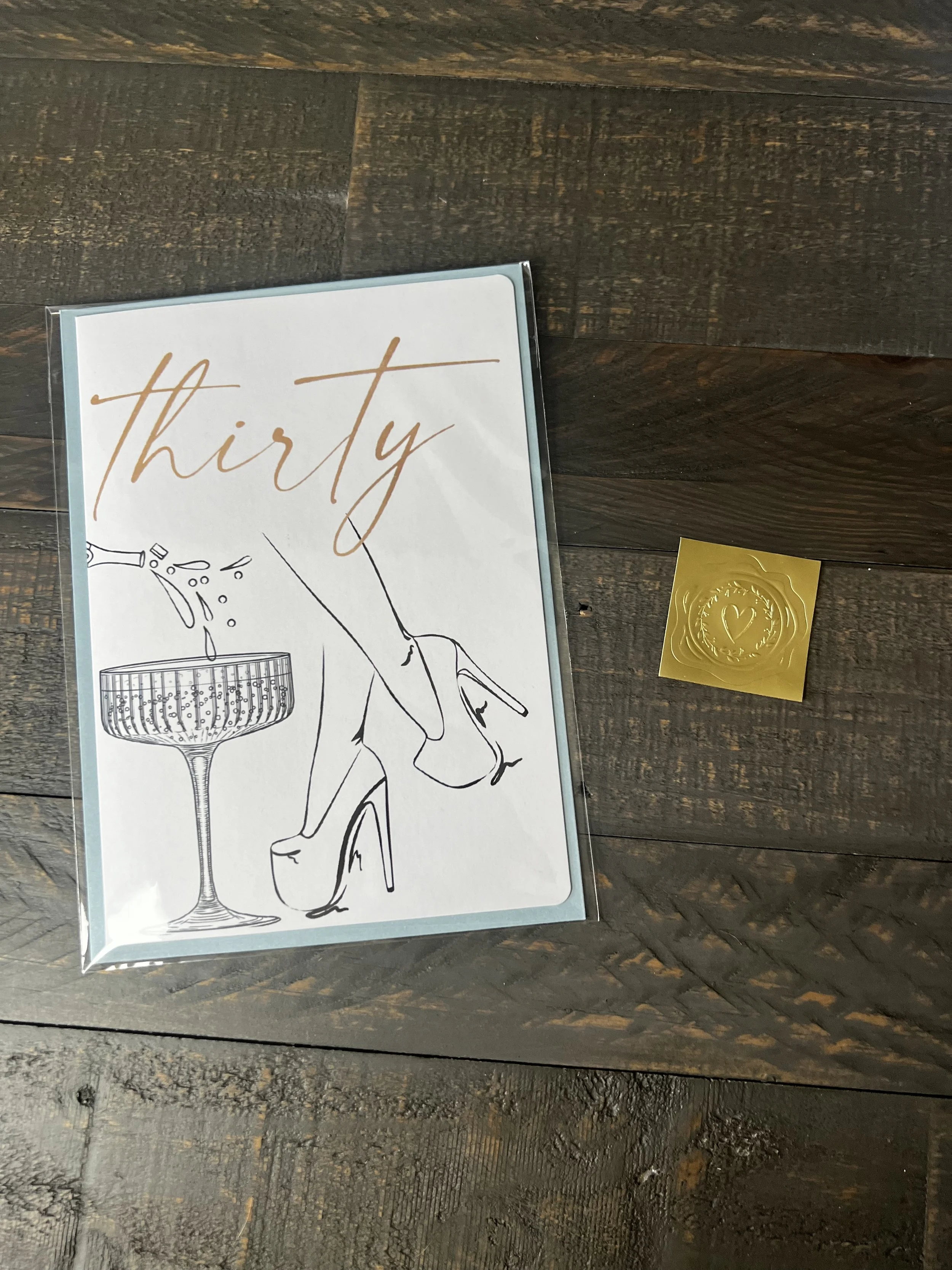 Thirty birthday greeting card with gold wax seal style sticker.