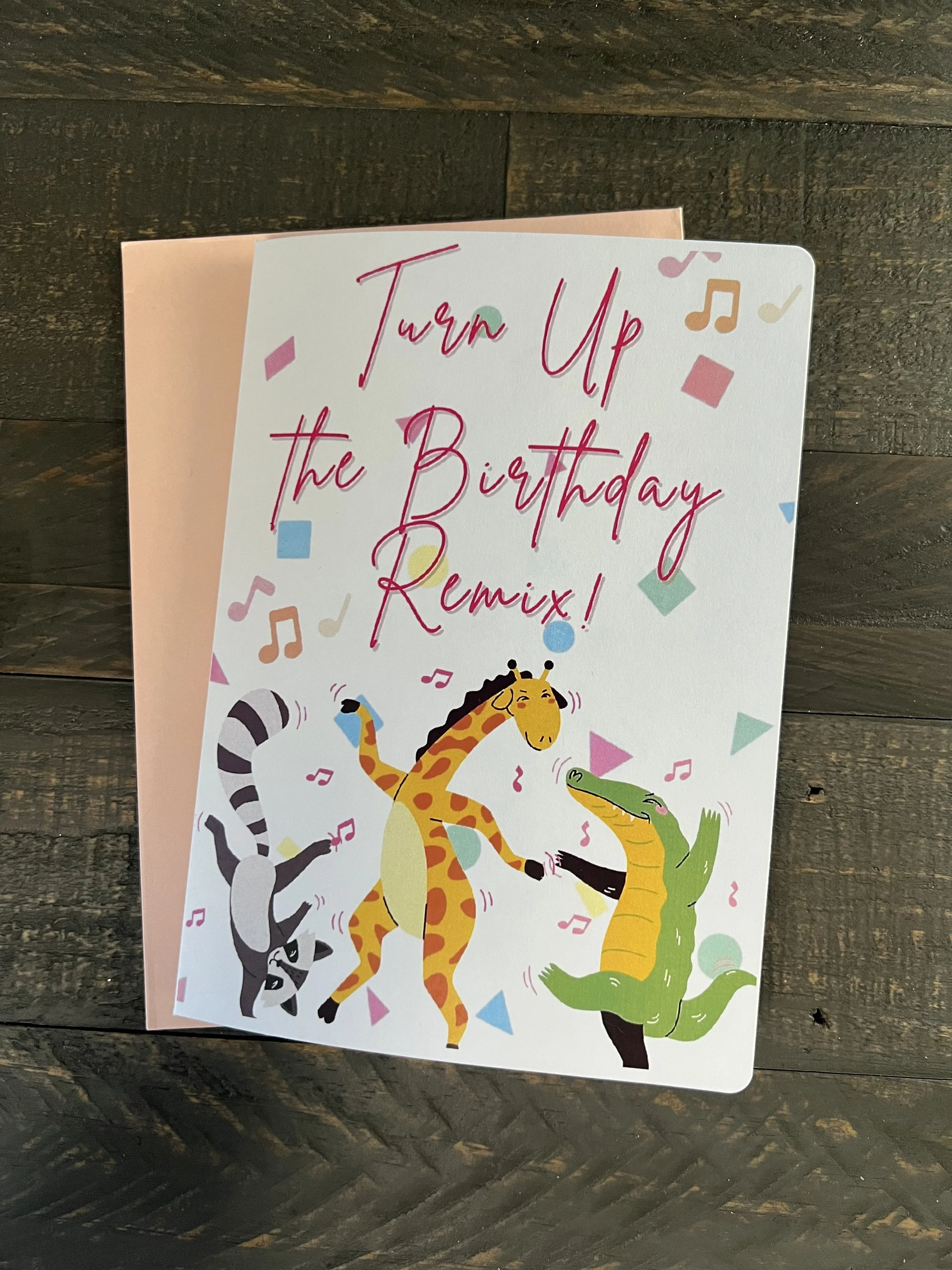 Music-themed birthday card with “Turn Up the Birthday Remix” text on a styled background