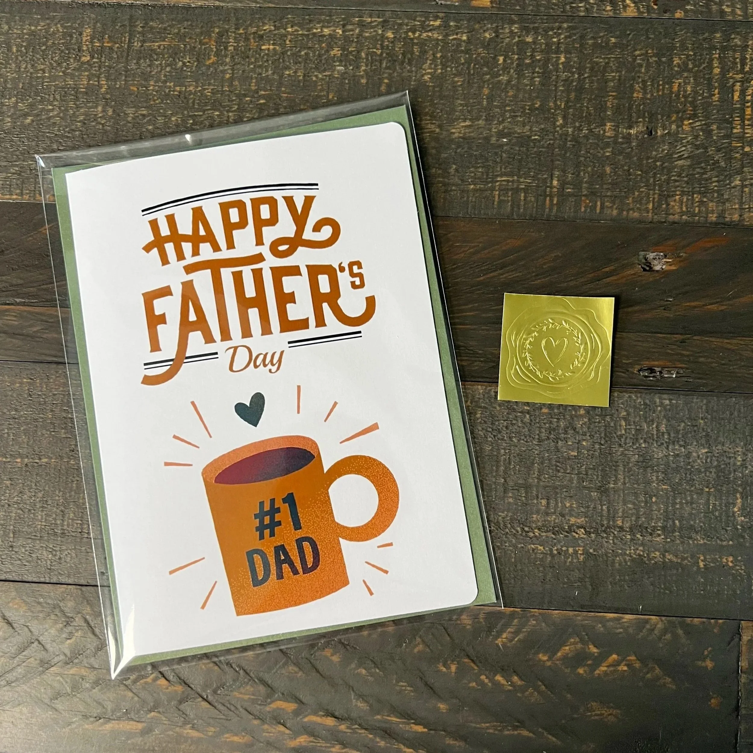 Coffee-themed Father’s Day card styled with sage green envelope and gold wax seal sticker