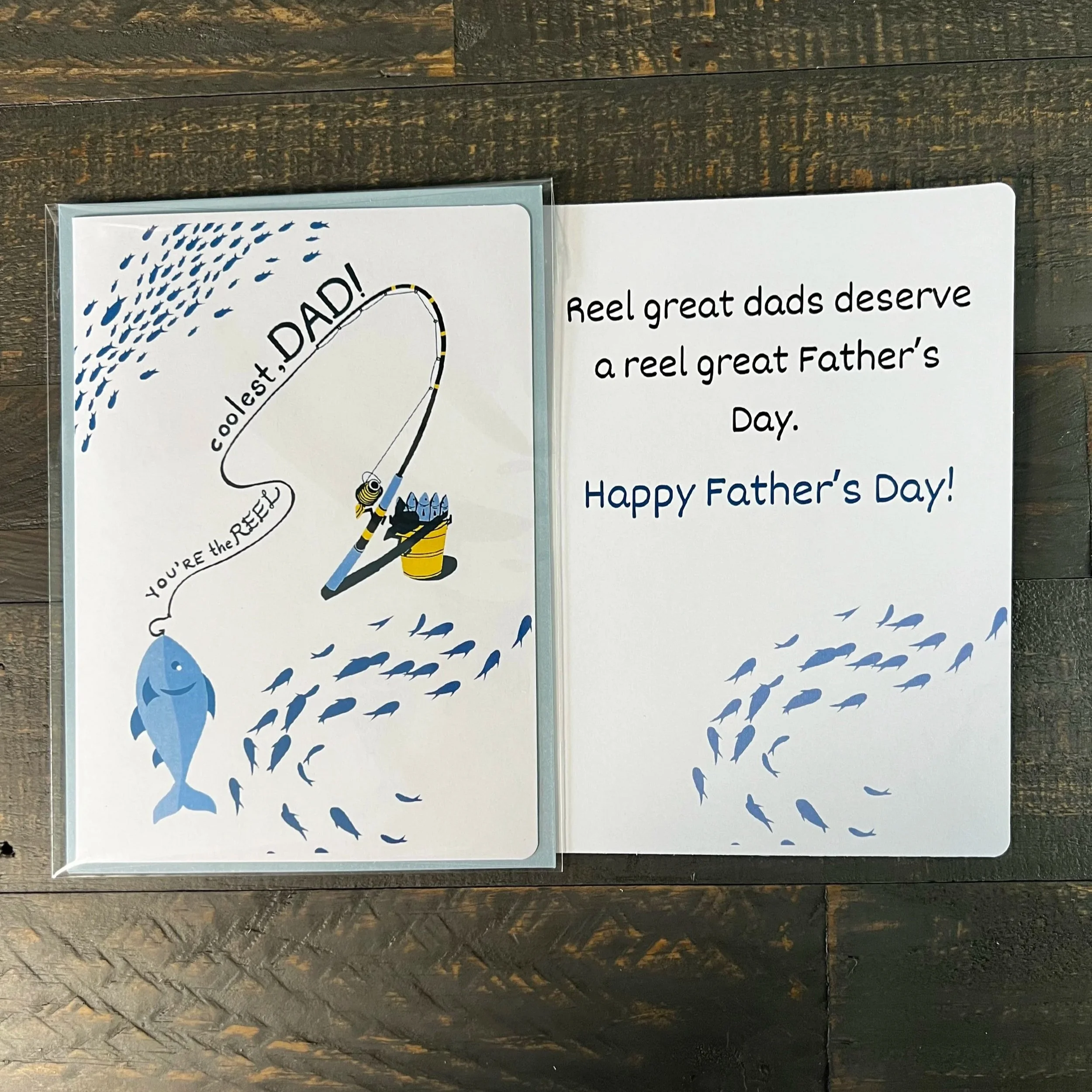Fishing Father’s Day card displayed open with front cover and funny inside message visible