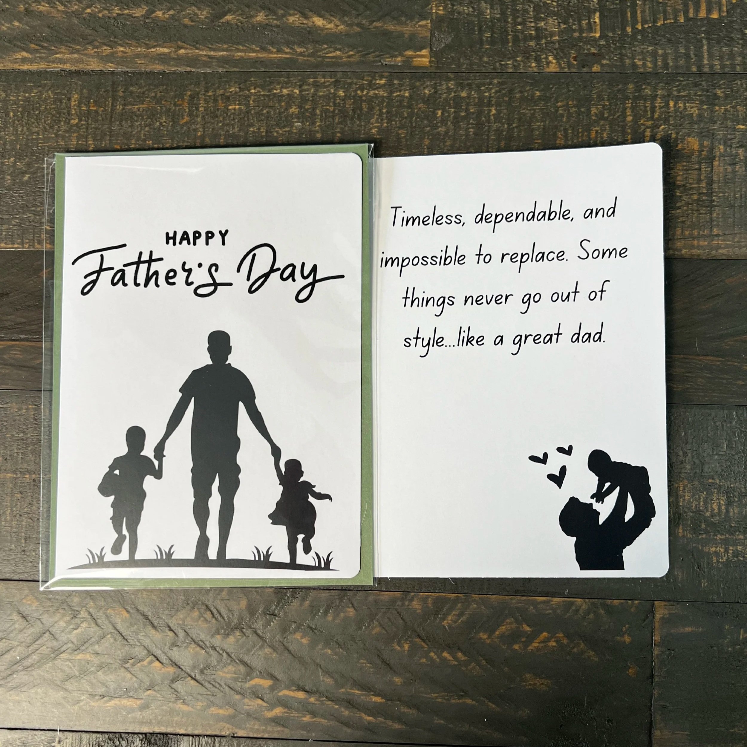 Father’s Day card displayed open with silhouette cover and heartfelt inside message visible