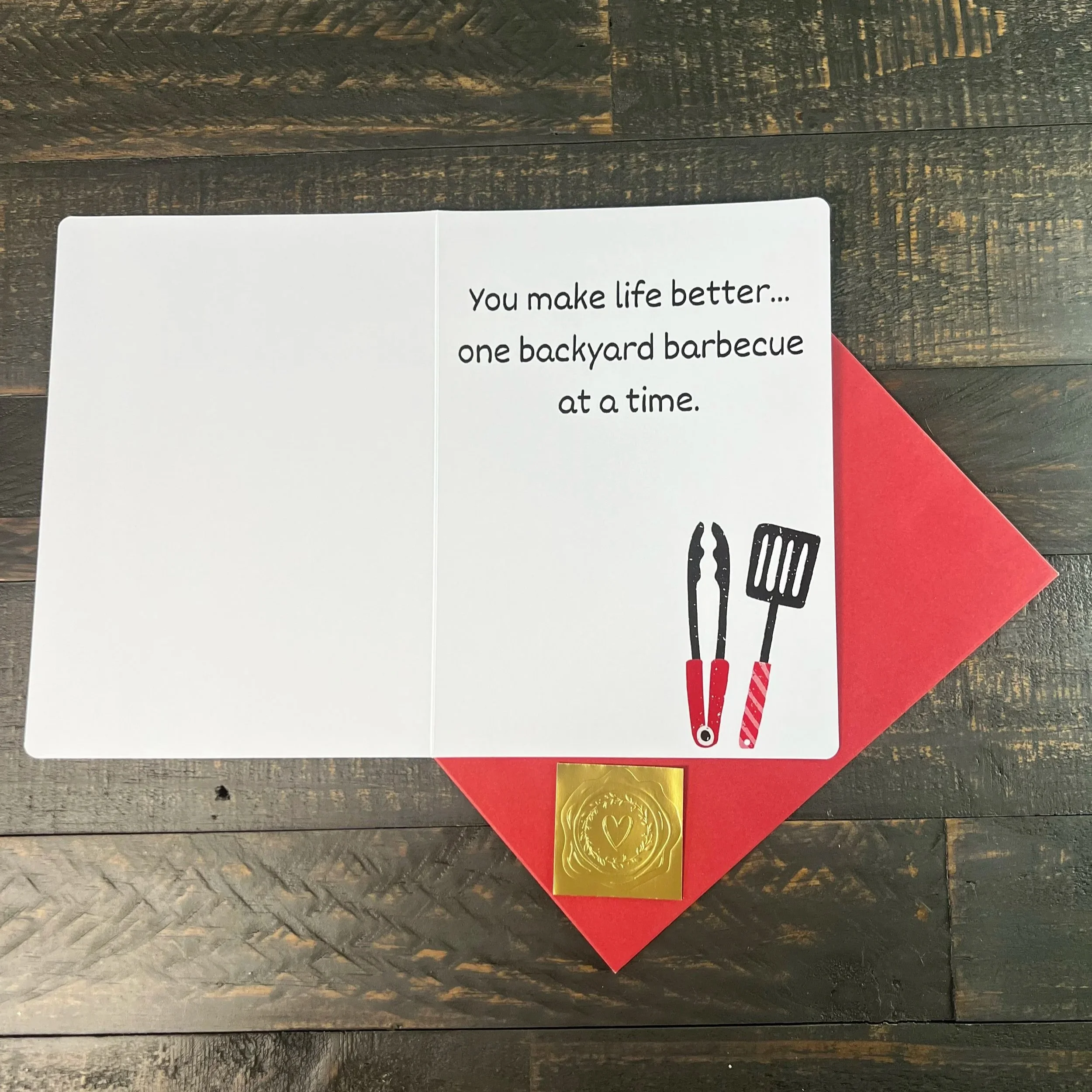 Inside message of grill-themed Father’s Day card reading “You make life better one backyard barbecue at a time”
