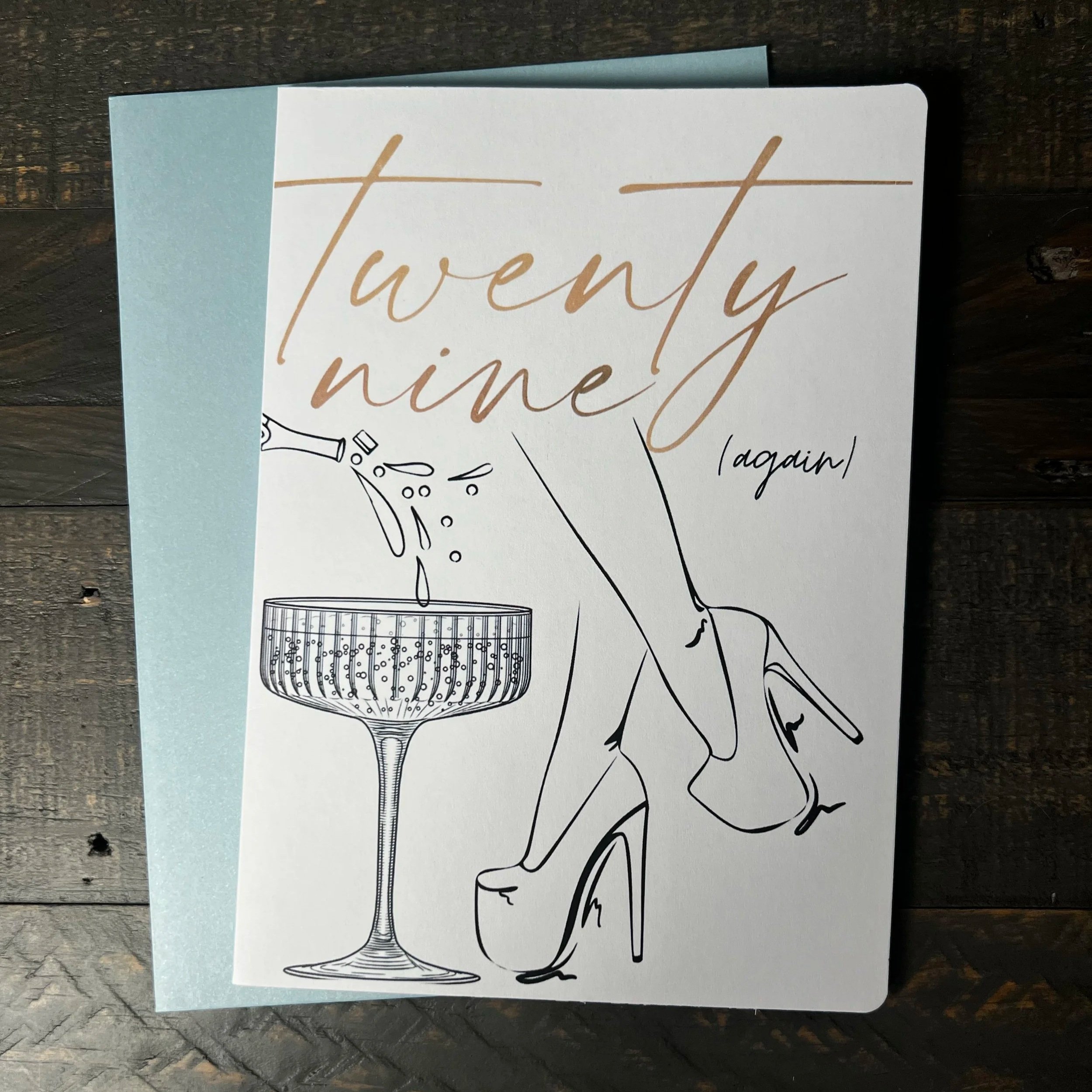 Front of Twenty-Nine Again greeting card with coordinating soft blue envelope.