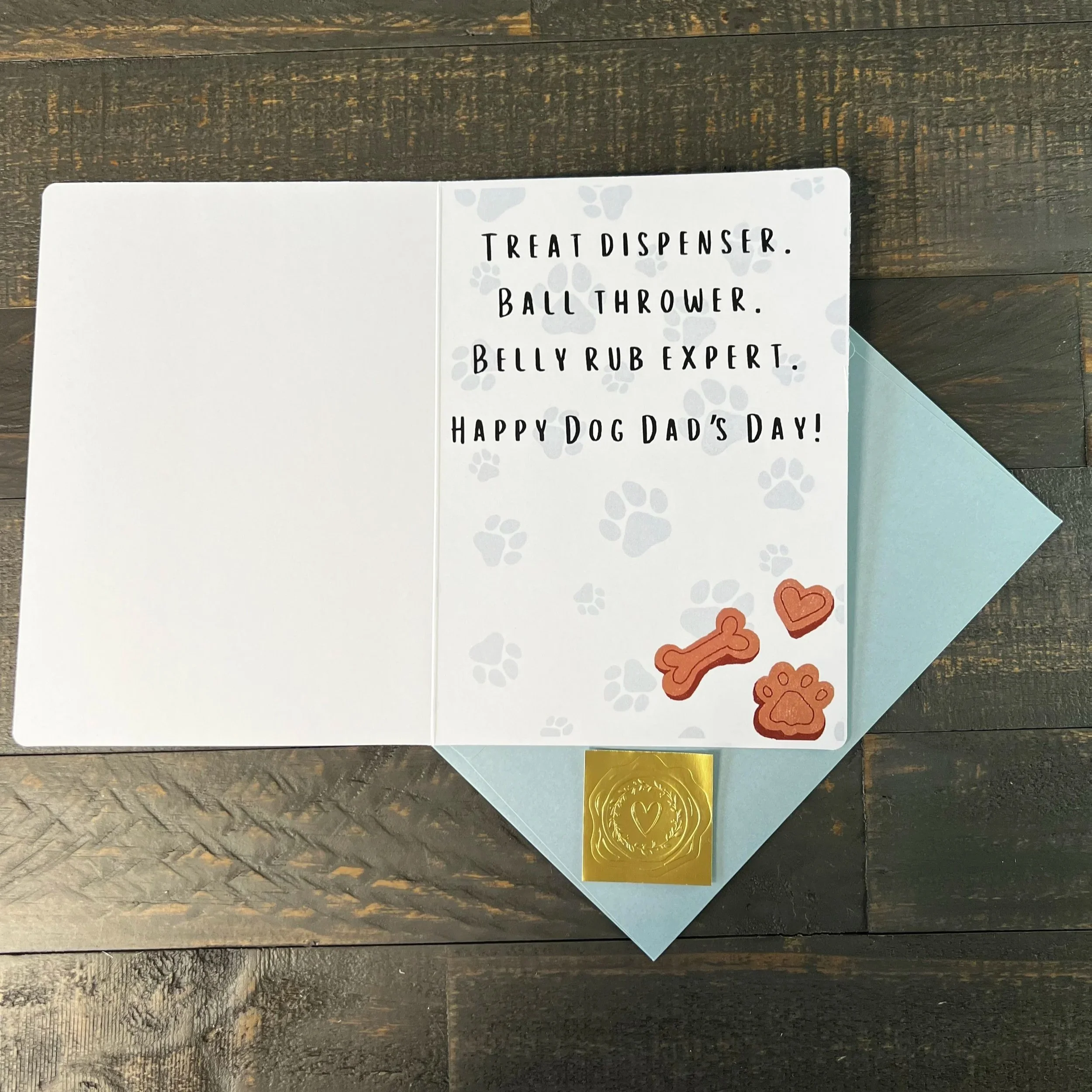 Inside message of dog dad Father’s Day card reading “Treat dispenser. Ball thrower. Belly rub expert.”