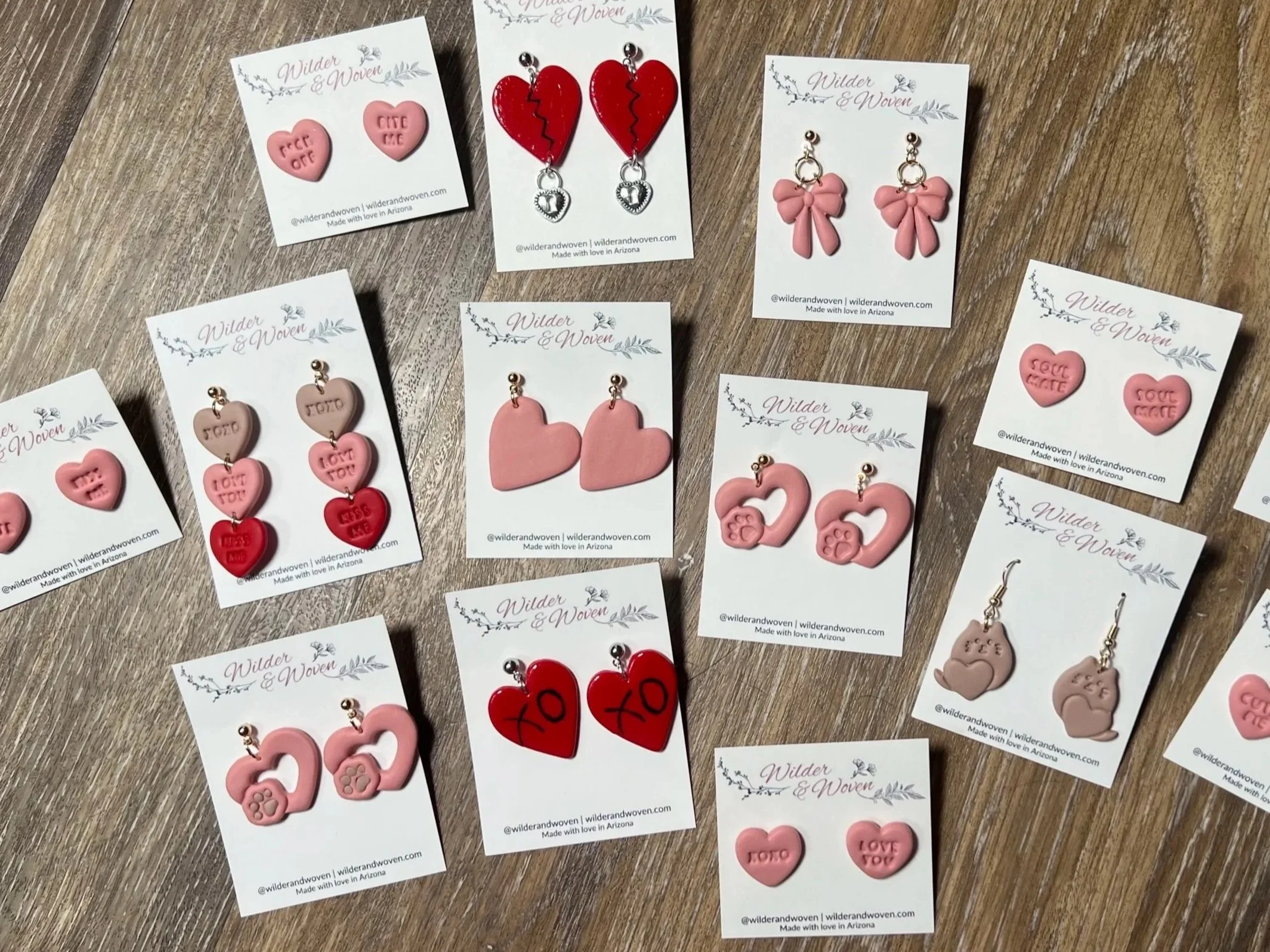 Sweet on You Valentine's Day earring collection by Wilder & Woven, featuring handmade heart-inspired designs in blush and red tones.