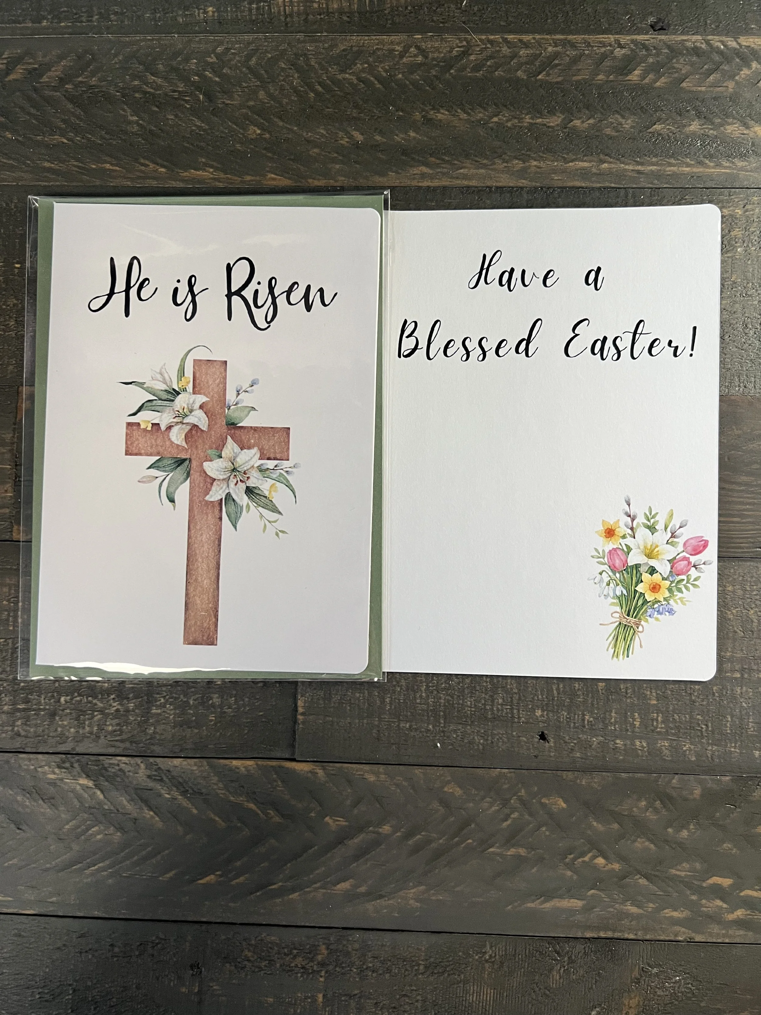 Open Easter card showing inside message “Have a Blessed Easter!” with floral cross on front