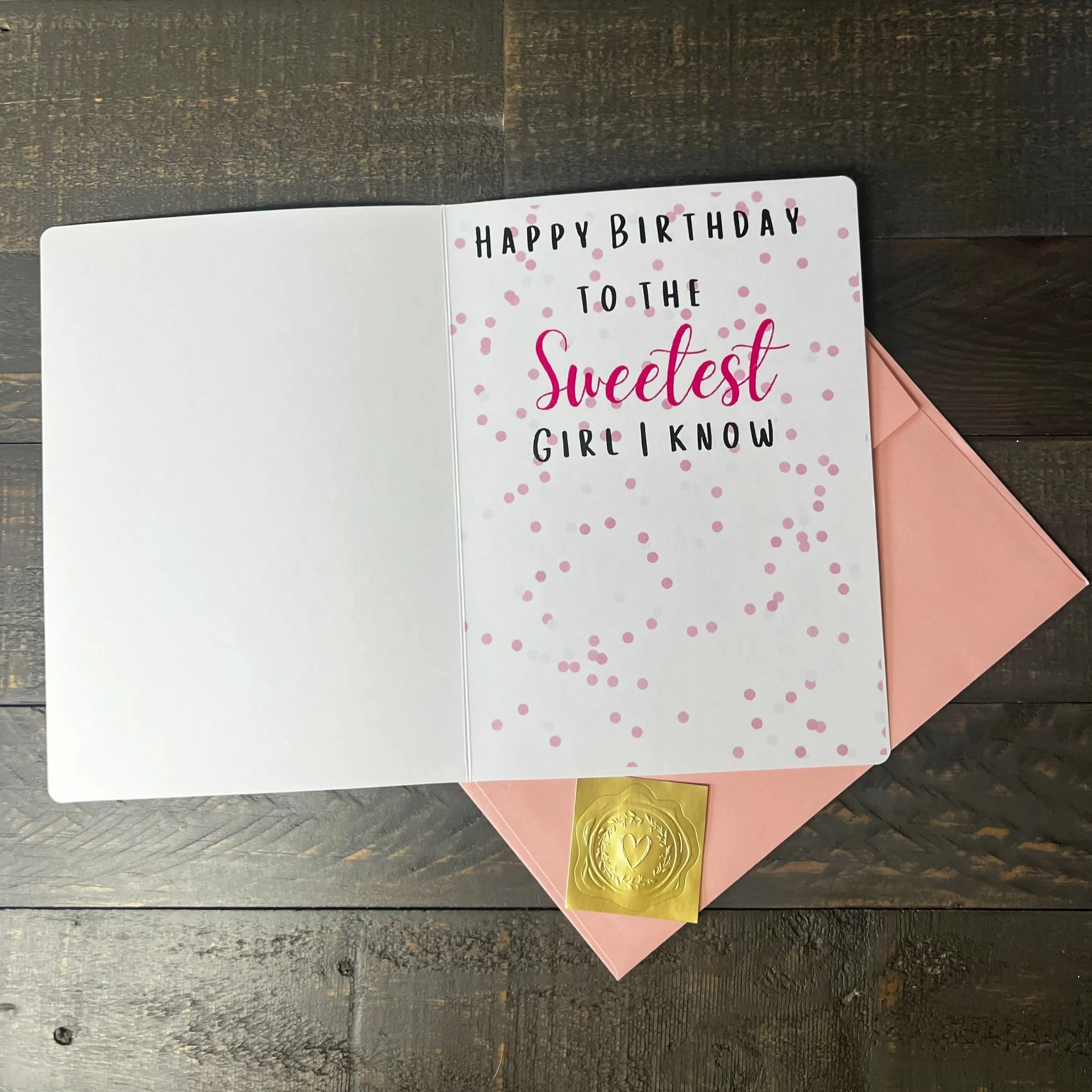 Open Sweetest Girl Birthday Card with coordinating pink envelope and gold wax seal style sticker.