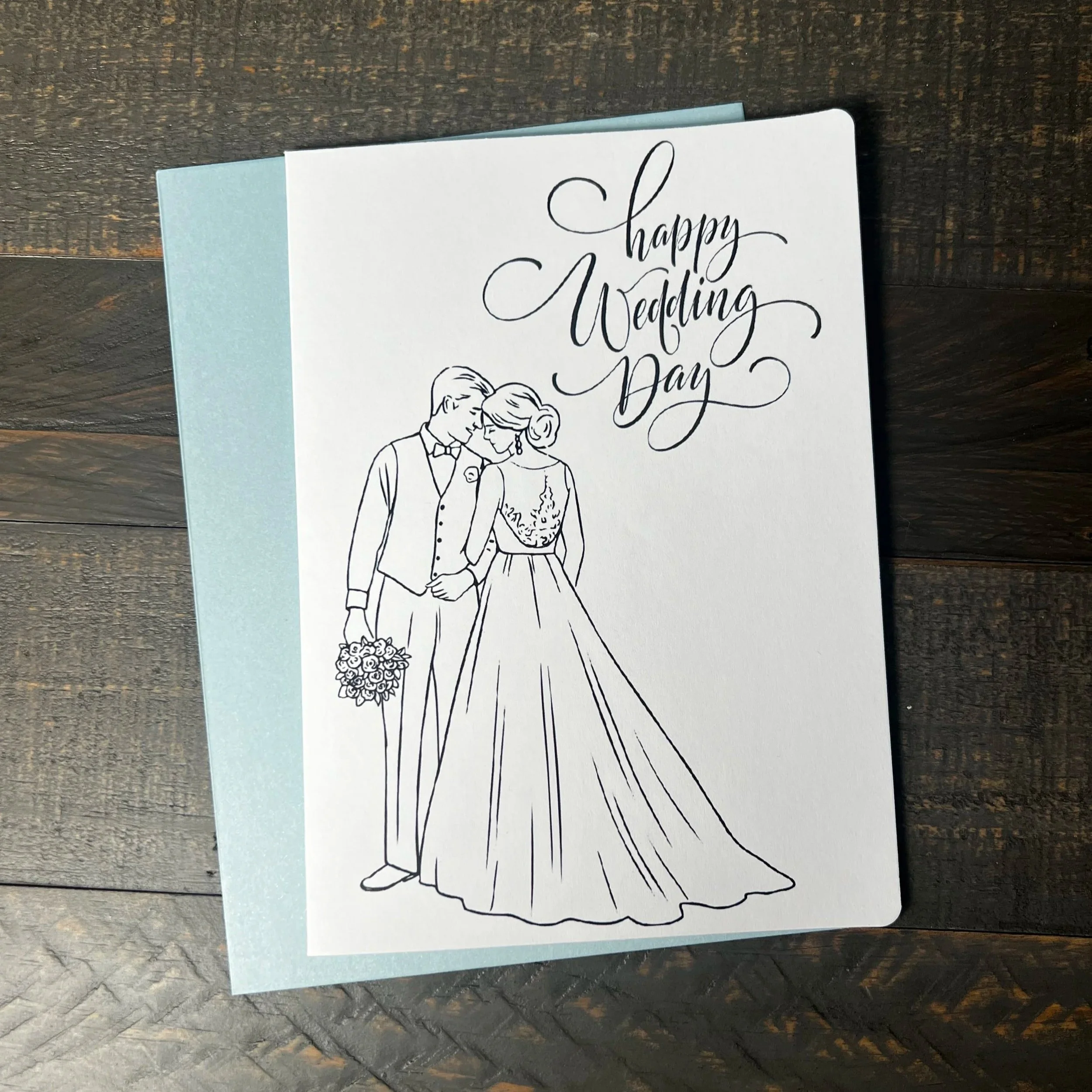 Front of Happy Wedding Day Card with coordinating soft blue envelope.