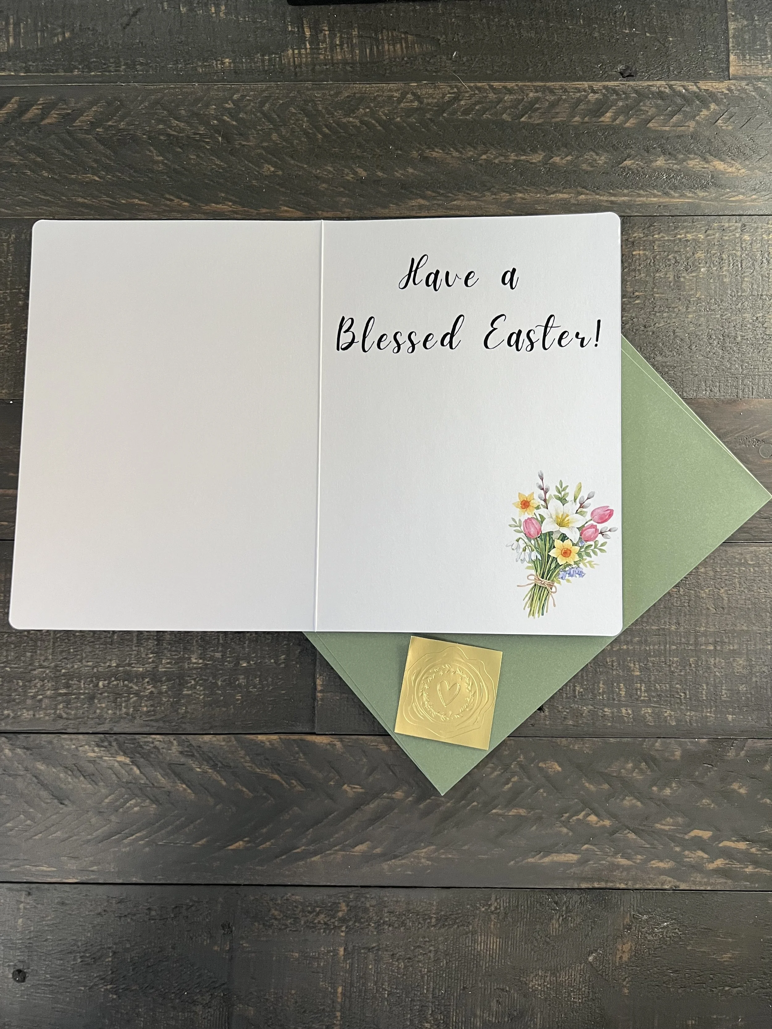 Inside of religious Easter card with “Have a Blessed Easter!” text and small floral illustration