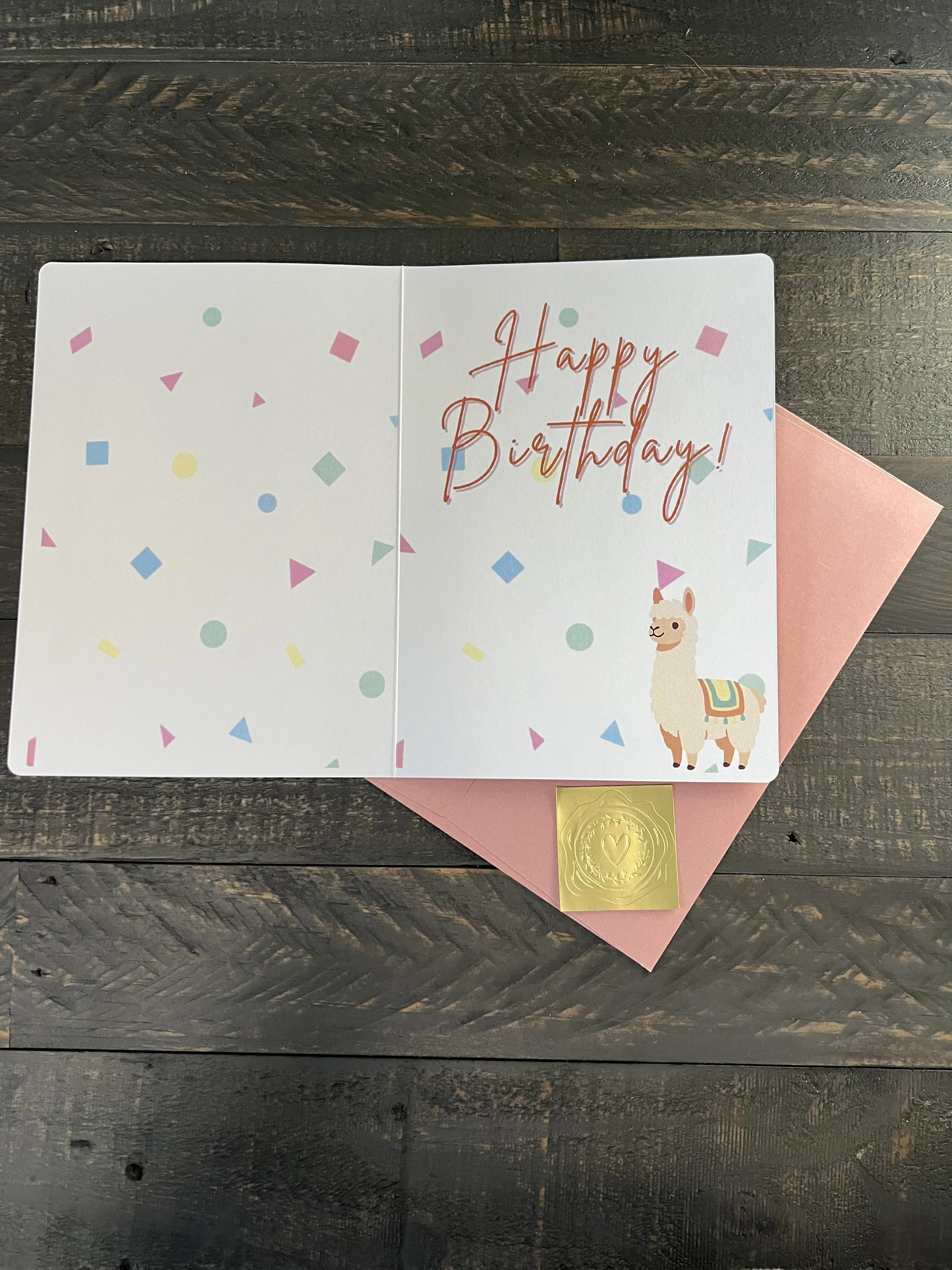 Inside of birthday card with printed message and playful confetti accents