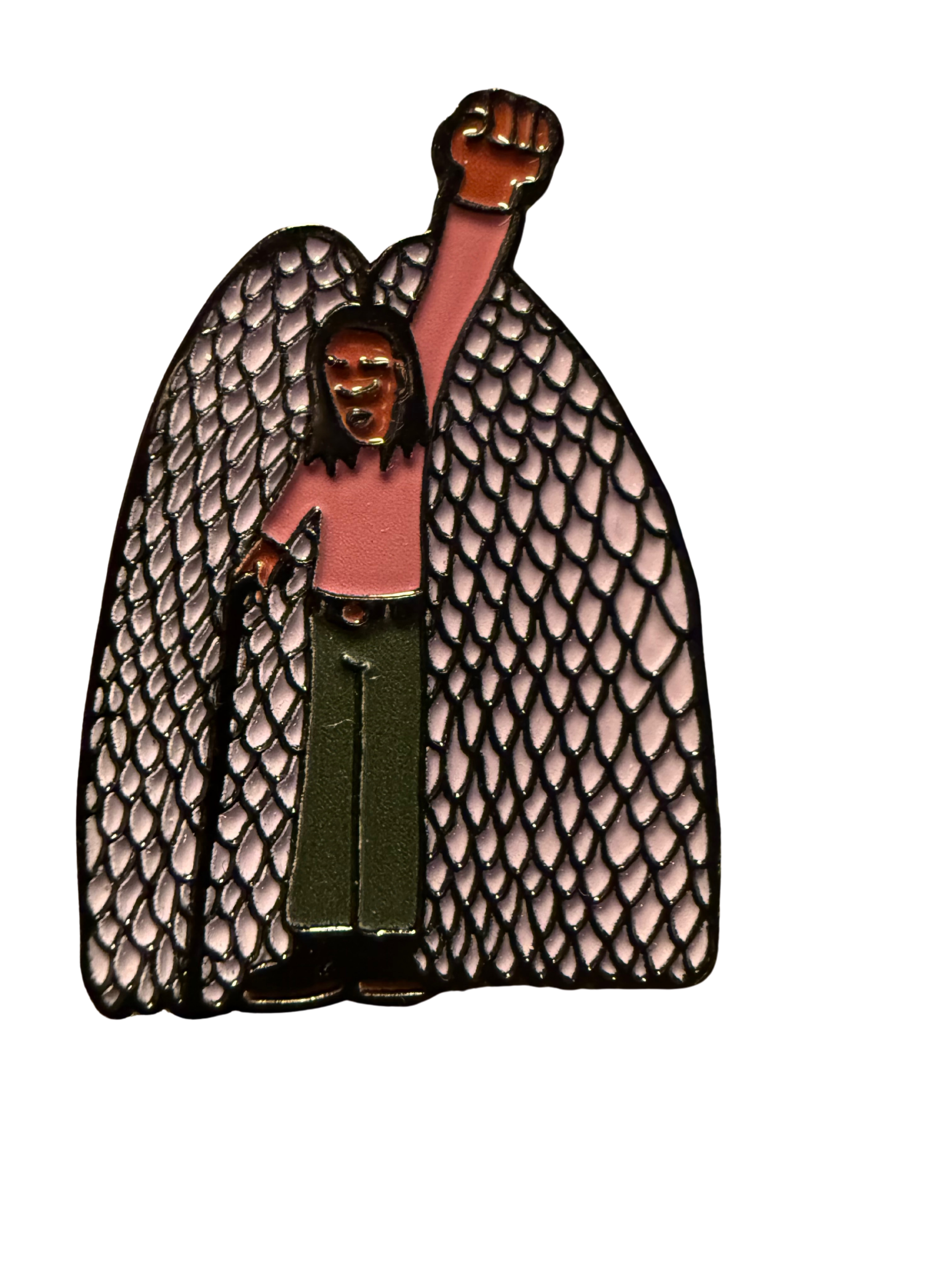Enamel pin featuring a person with black hair, wearing green pants, pink shirt, and large wings. The person has their fist raised in the air.