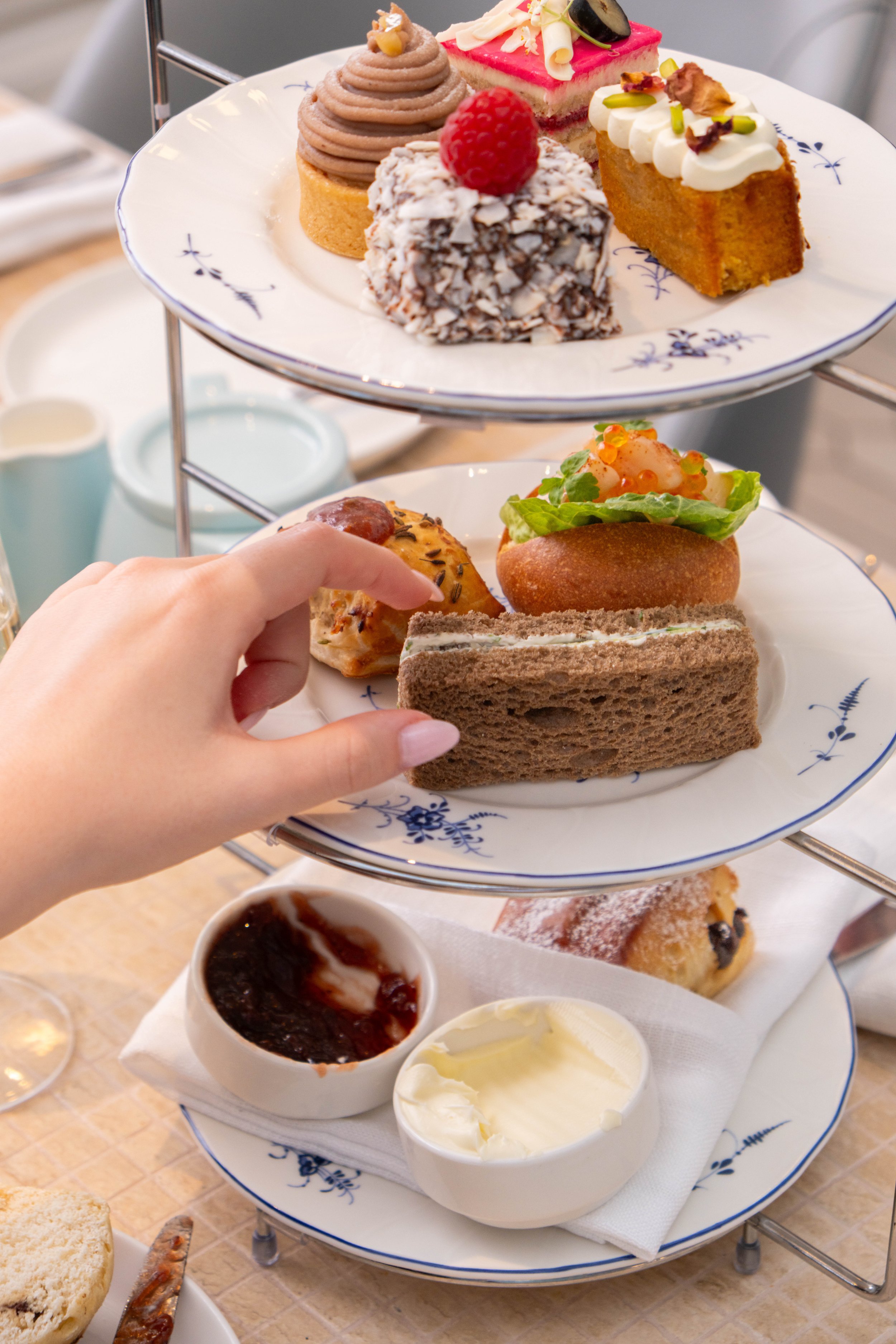 Three-tier afternoon tea stand prepared in-house at Shutters Coogee