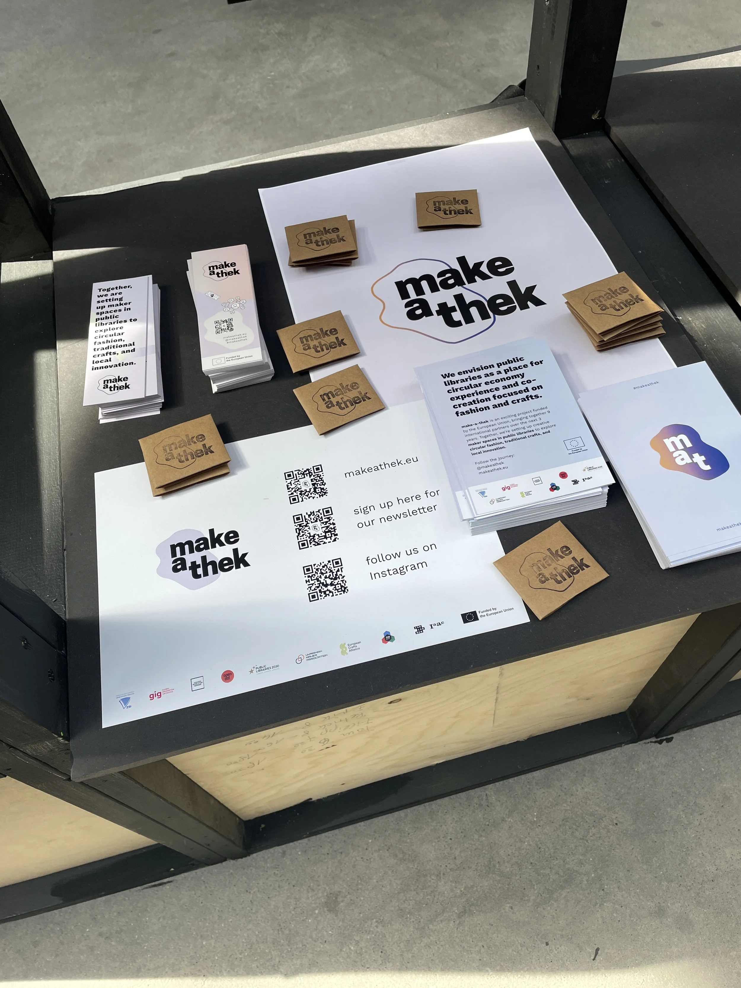 project merch with flyers, bookmarks and Info posters