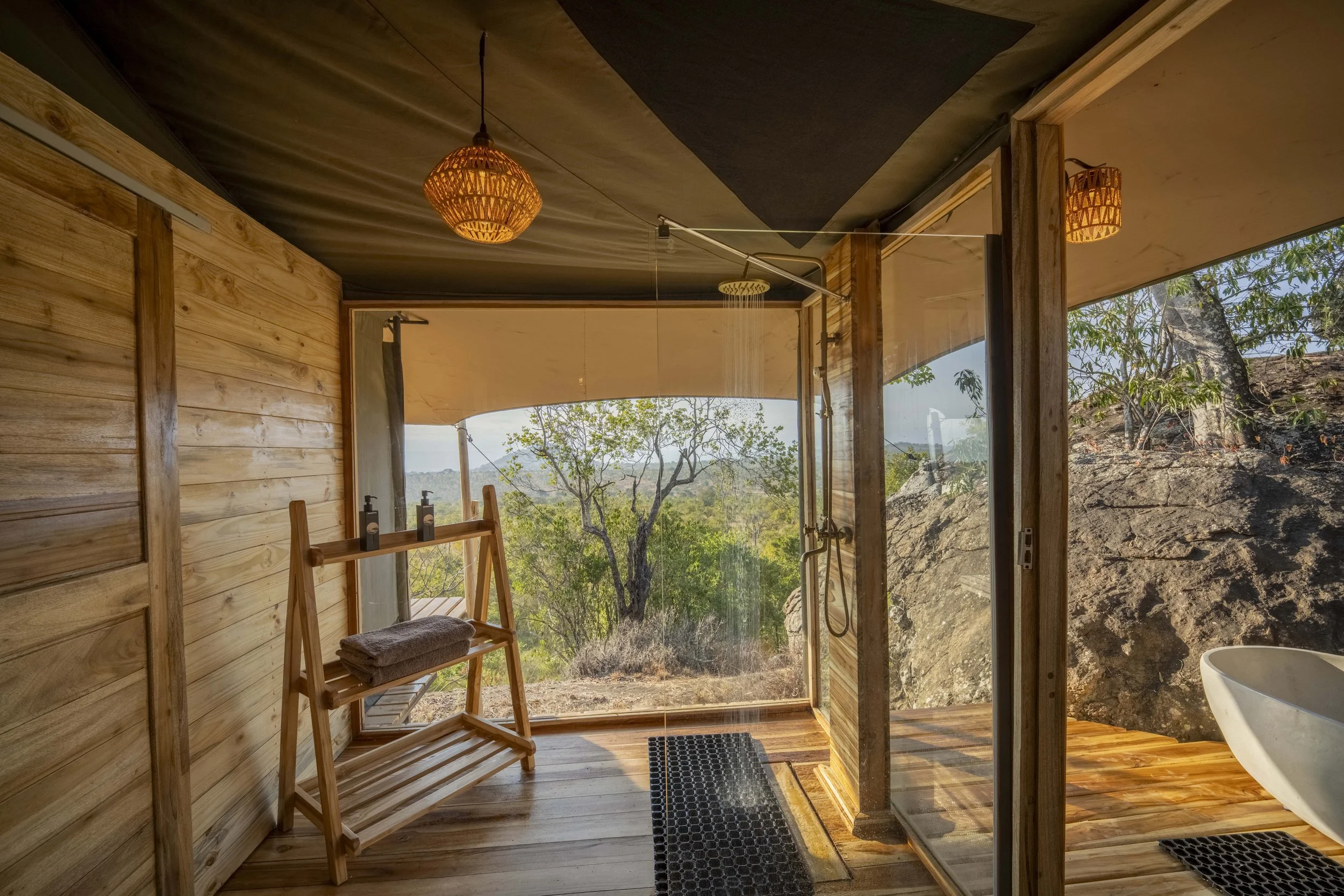 16. Glass-enclosed rain shower with landscape views.jpg
