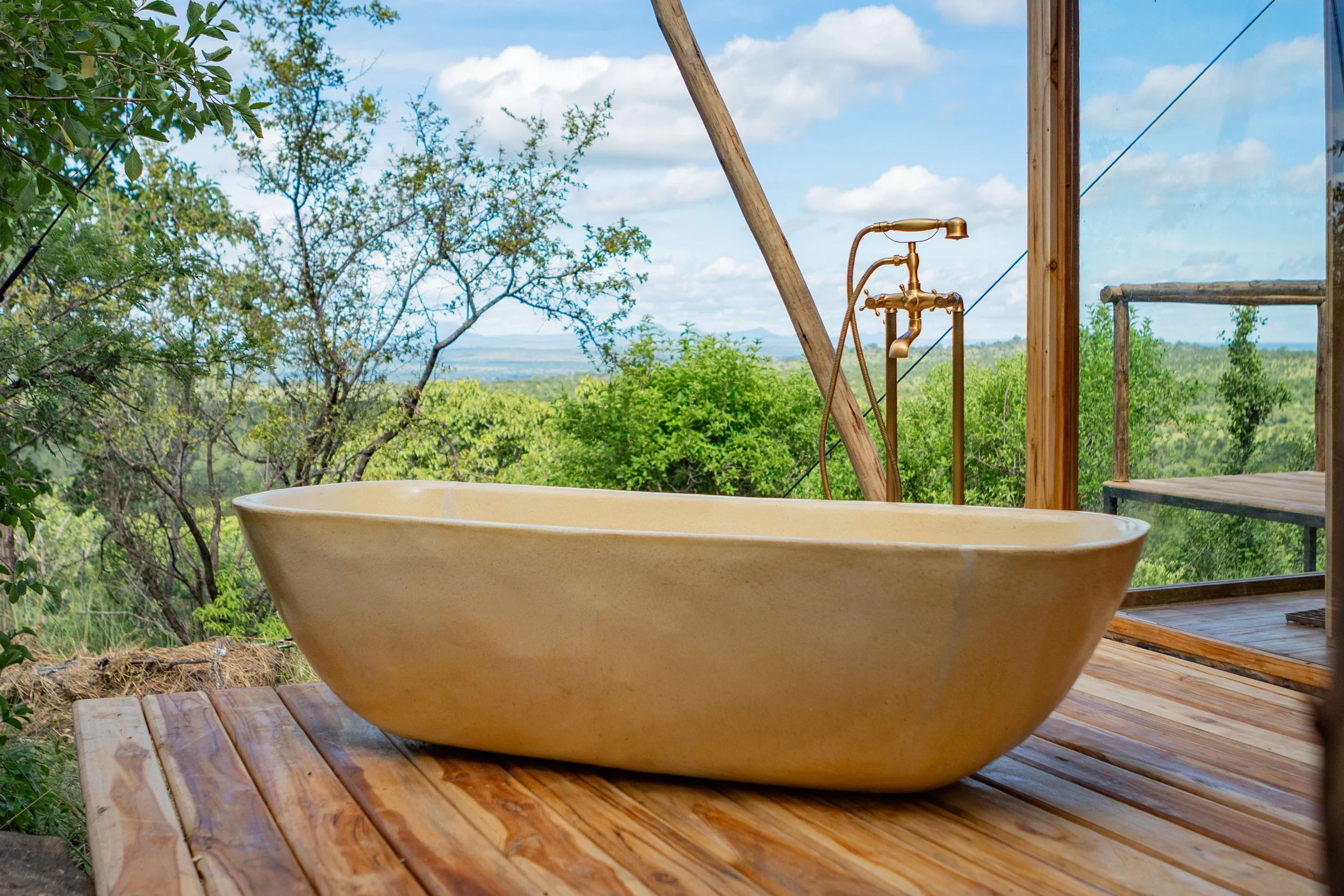 14. Open-air bath with views across the park.jpg