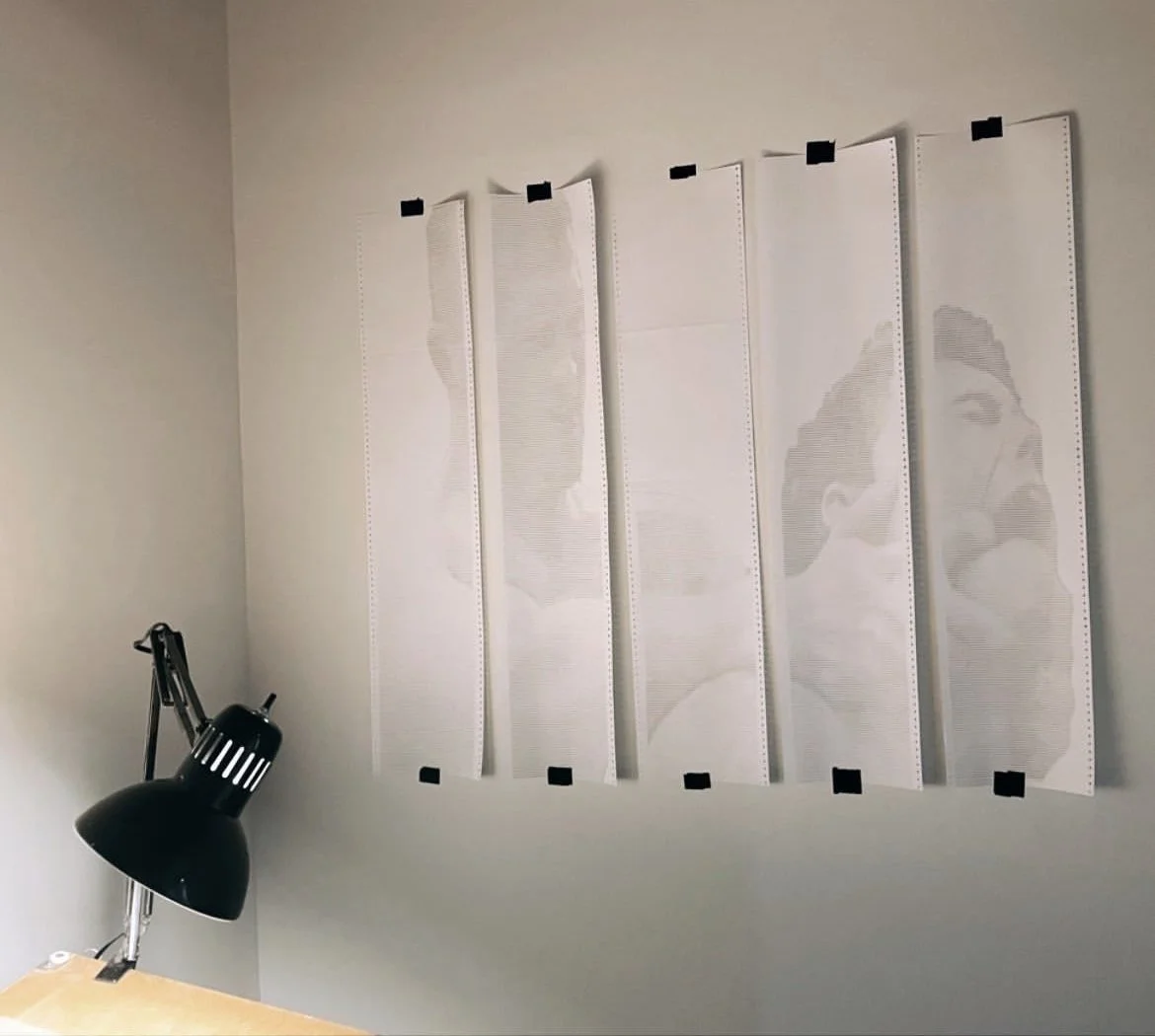 BACKLOGGED by CHARACTERS installed on a wall as a large five-sheet contemporary homoerotic art study.